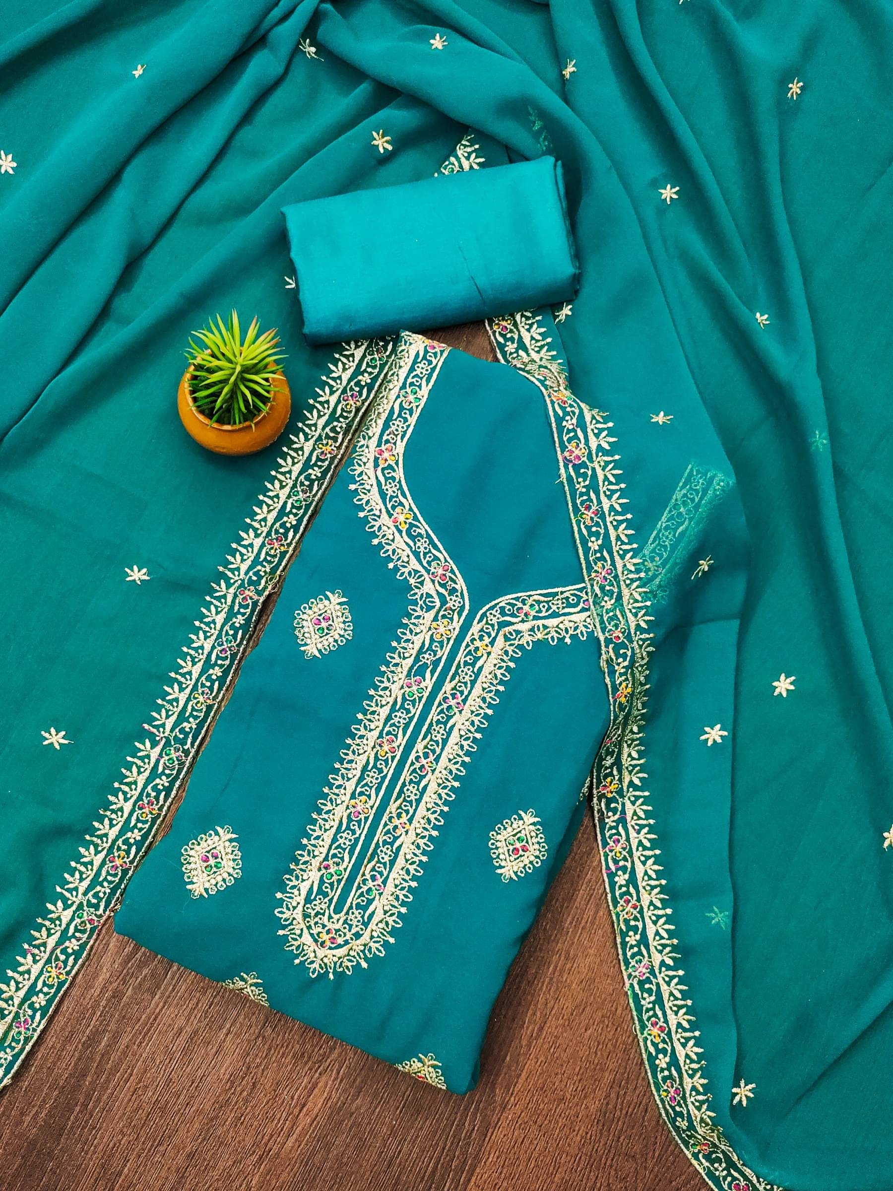 Rangtulika Ethnics Unstitched Georgette Embroidered Dress Material - Blue ( Pack of 1 ) Rangtulika Ethnics Unstitched Georgette Embroidered Dress Material - Blue ( Pack of 1 )