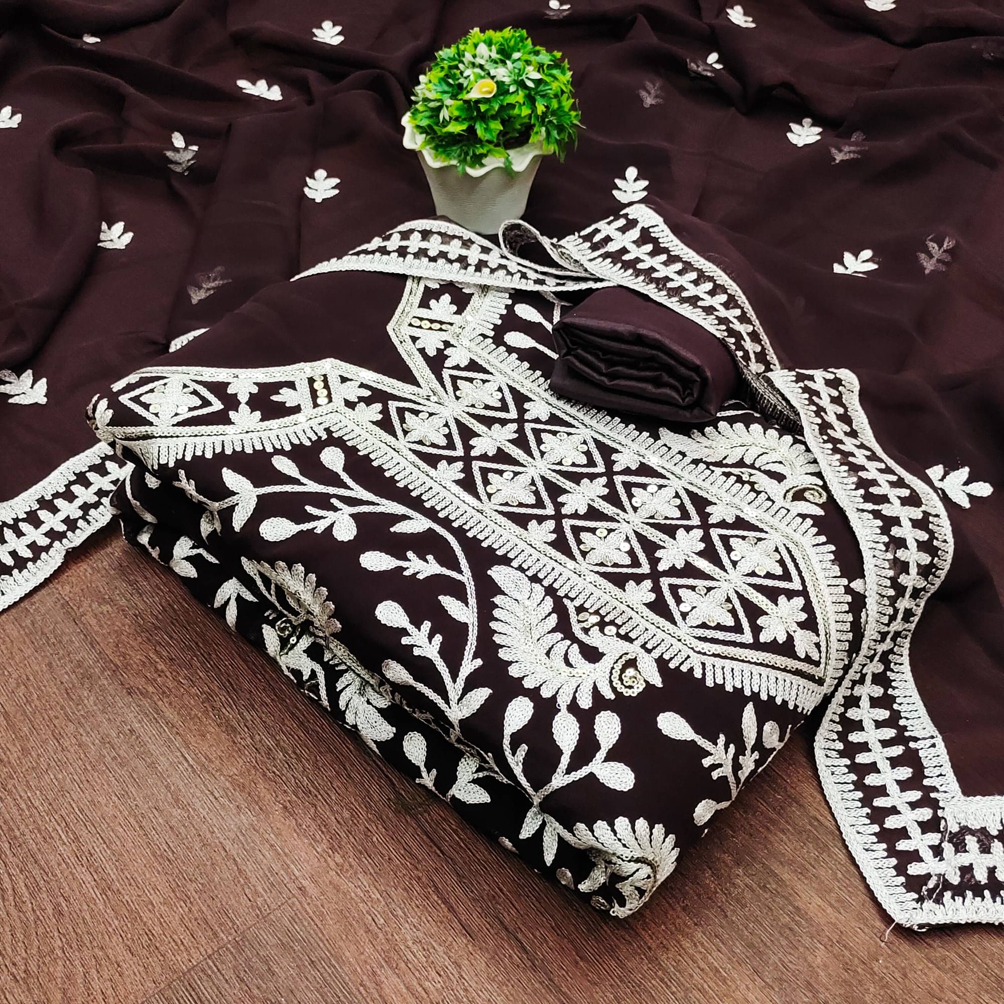 Rangtulika Ethnics Unstitched Georgette Embroidered Dress Material - Brown ( Pack of 1 ) Rangtulika Ethnics Unstitched Georgette Embroidered Dress Material - Brown ( Pack of 1 )