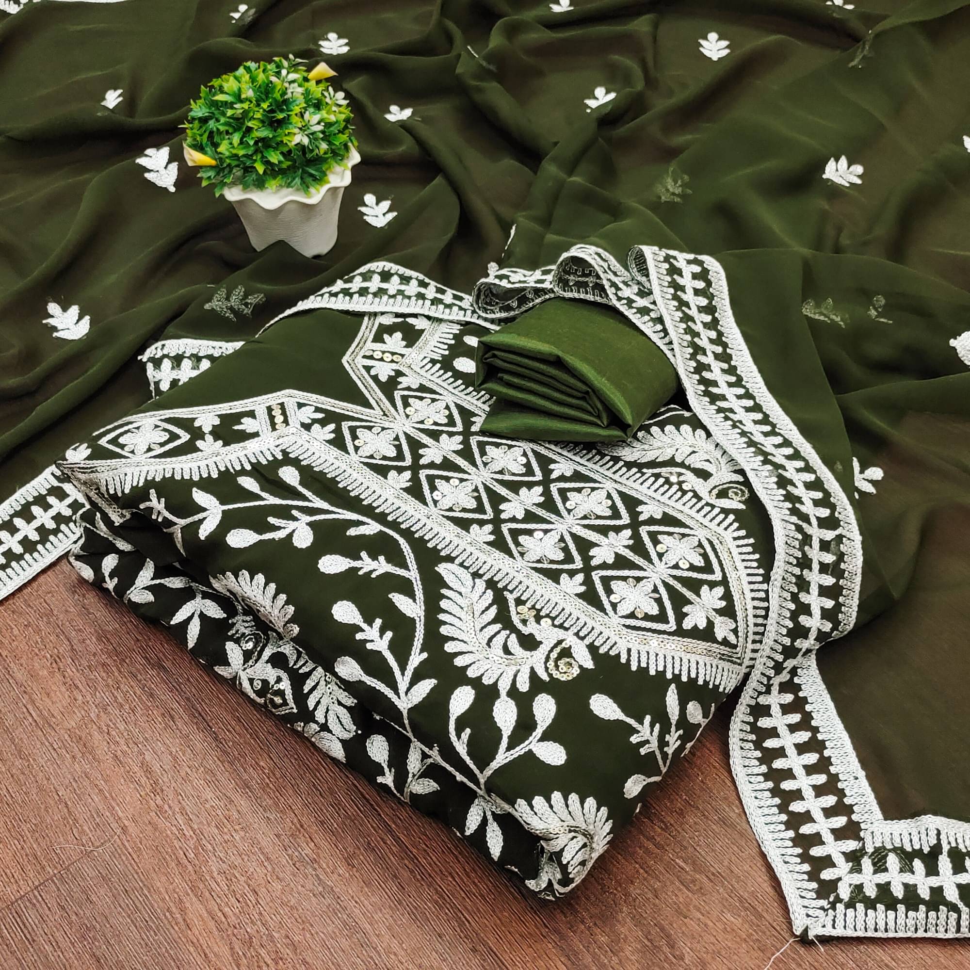 Rangtulika Ethnics Unstitched Georgette Embroidered Dress Material - Olive ( Pack of 1 )     			Rangtulika Ethnics Unstitched Georgette Embroidered Dress Material - Olive ( Pack of 1 )