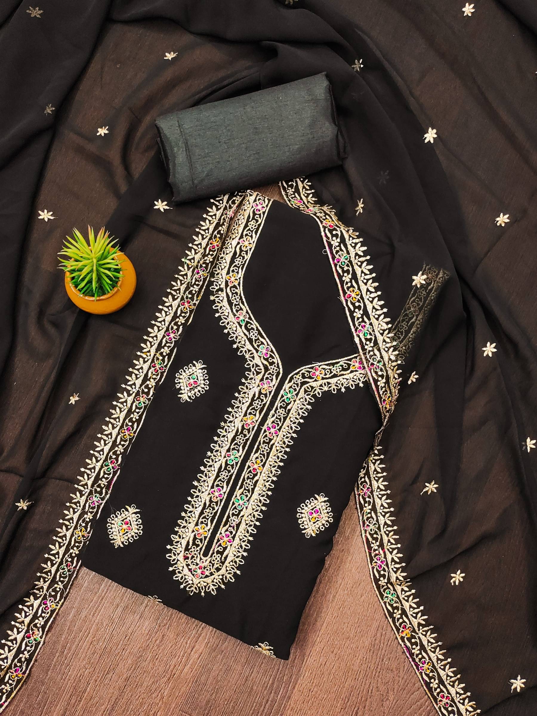 Rangtulika Ethnics Unstitched Georgette Embroidered Dress Material - Black ( Pack of 1 )     			Rangtulika Ethnics Unstitched Georgette Embroidered Dress Material - Black ( Pack of 1 )