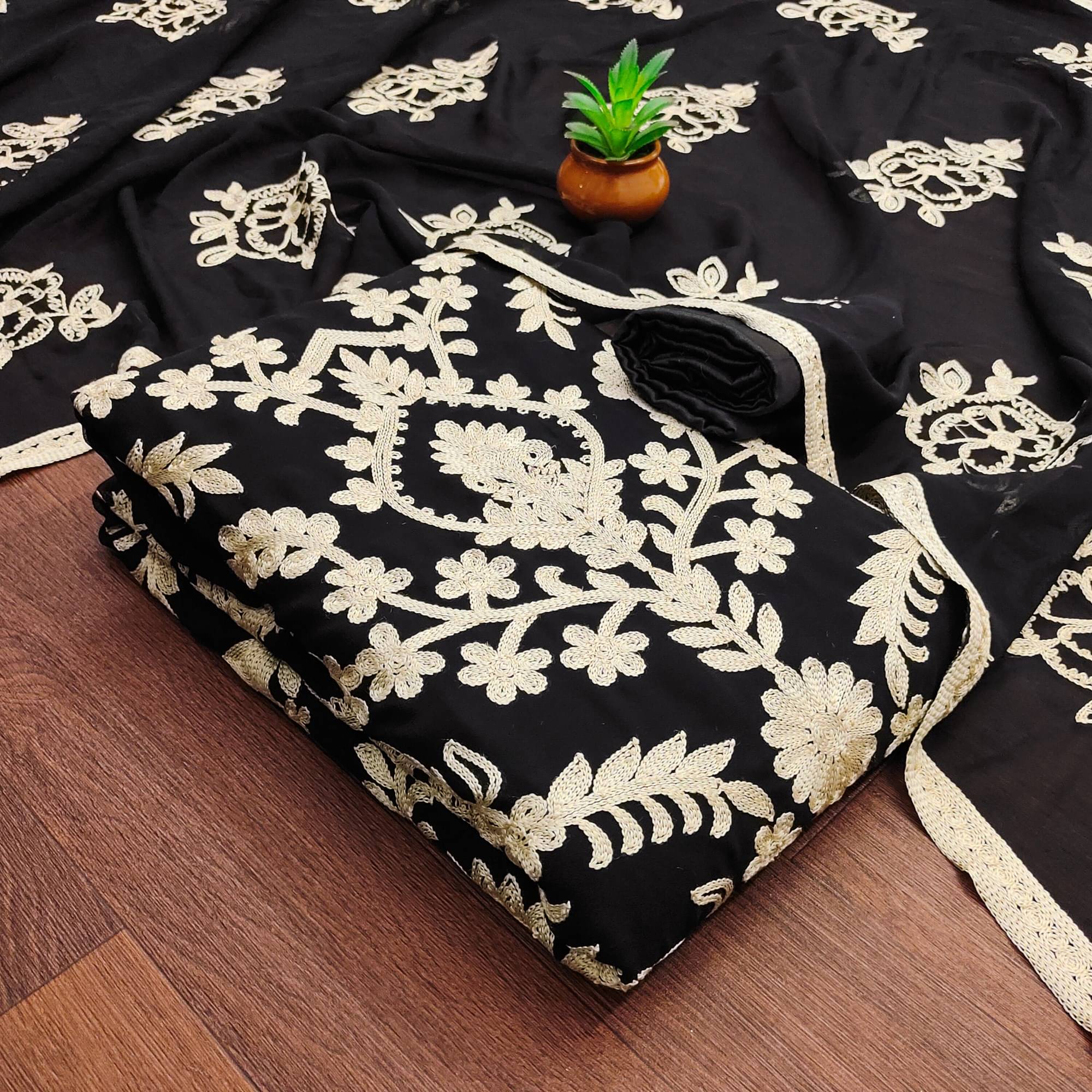     			Rangtulika Ethnics Unstitched Georgette Embroidered Dress Material - Black ( Pack of 1 )