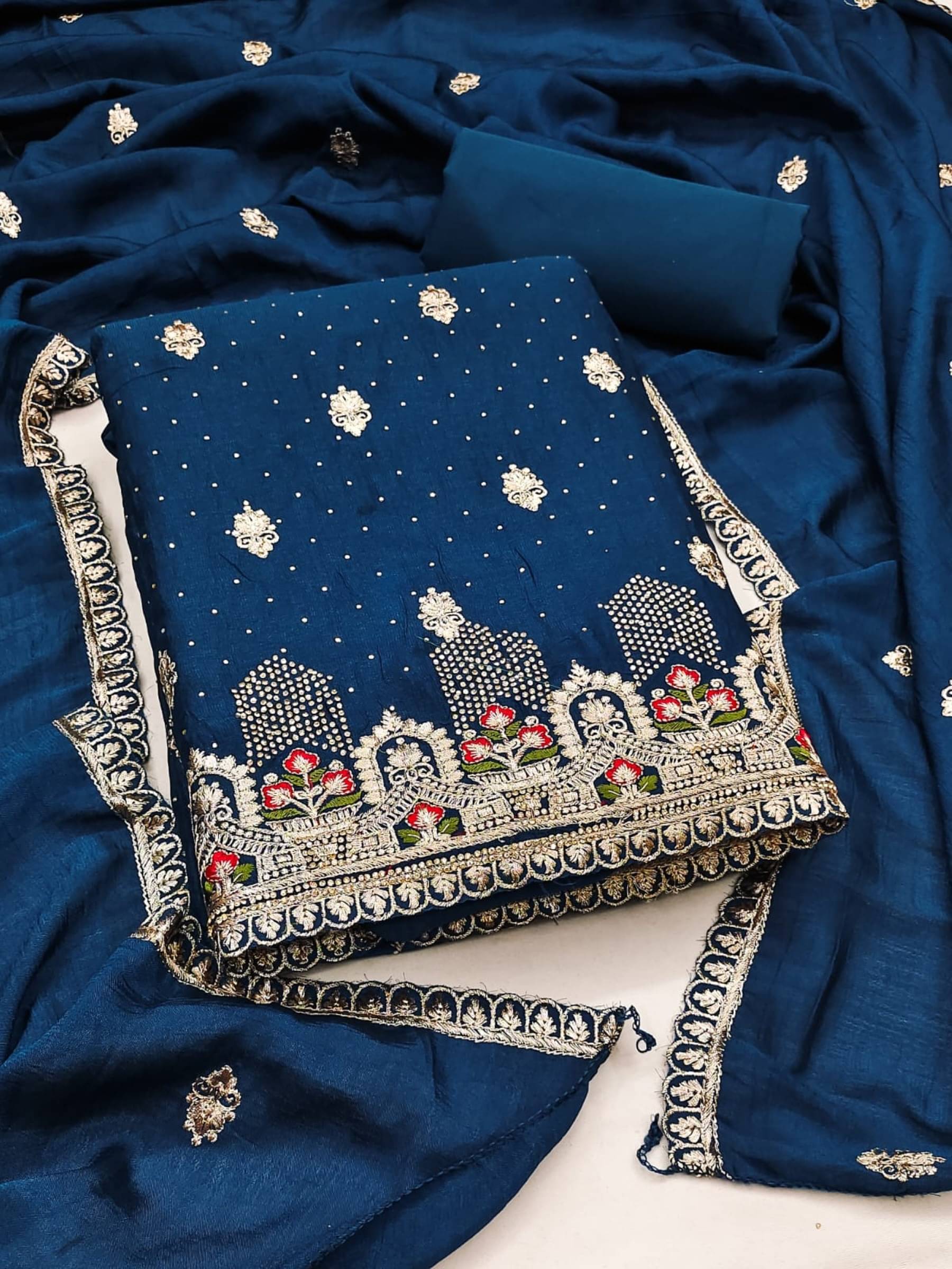 Rangtulika Ethnics Unstitched Georgette Embroidered Dress Material - Blue ( Pack of 1 )     			Rangtulika Ethnics Unstitched Georgette Embroidered Dress Material - Blue ( Pack of 1 )