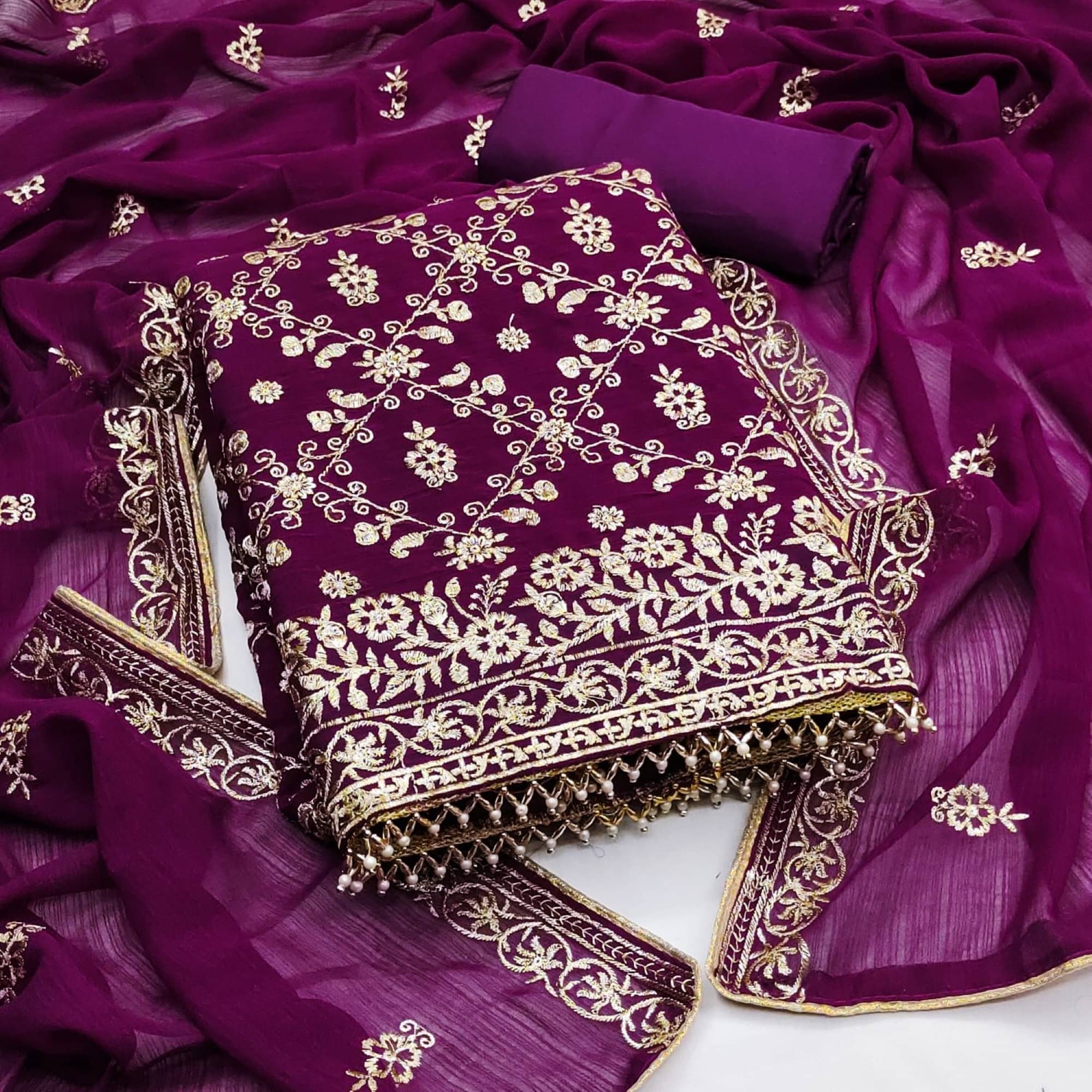     			Rangtulika Ethnics Unstitched Georgette Embroidered Dress Material - Purple ( Pack of 1 )