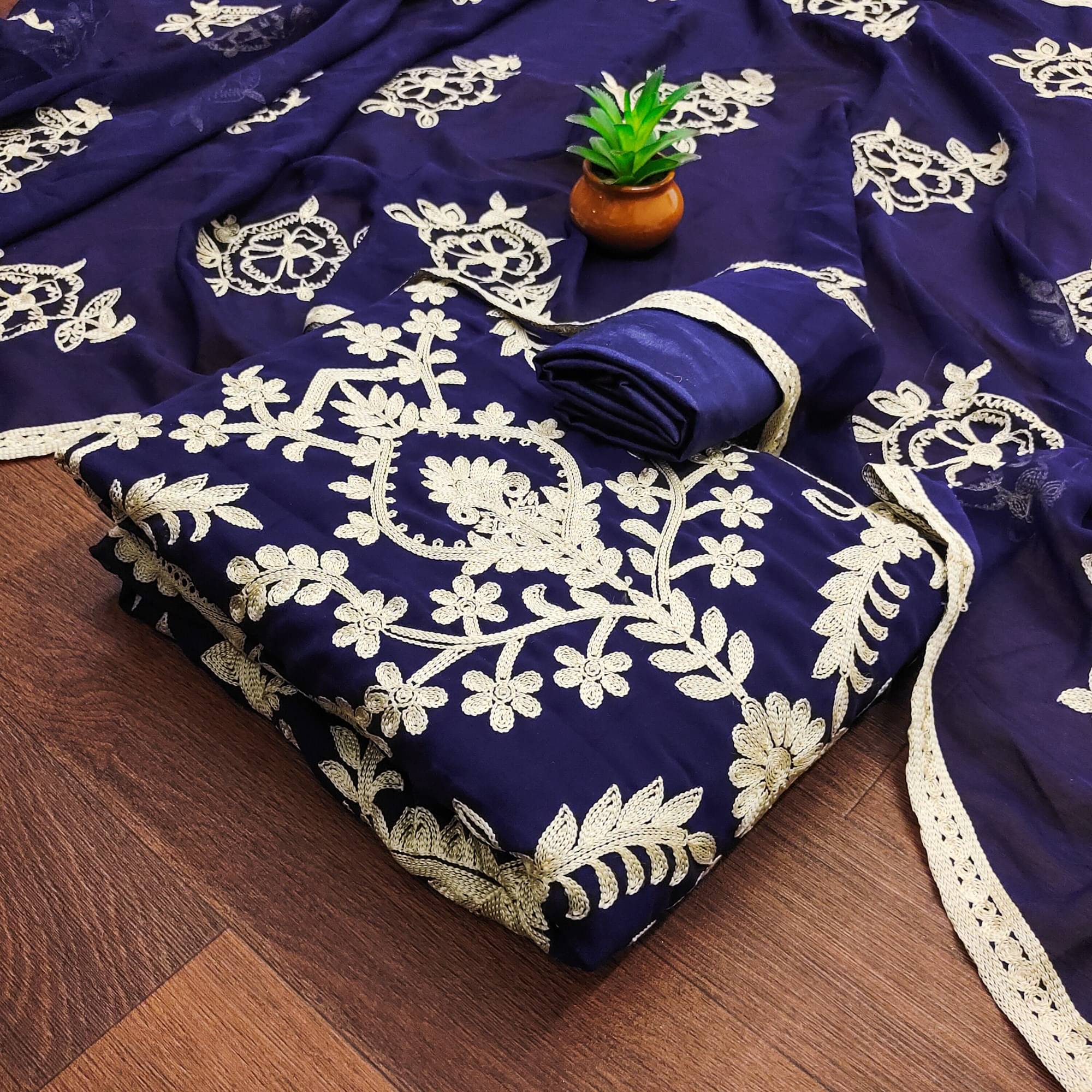     			Rangtulika Ethnics Unstitched Georgette Embroidered Dress Material - Blue ( Pack of 1 )