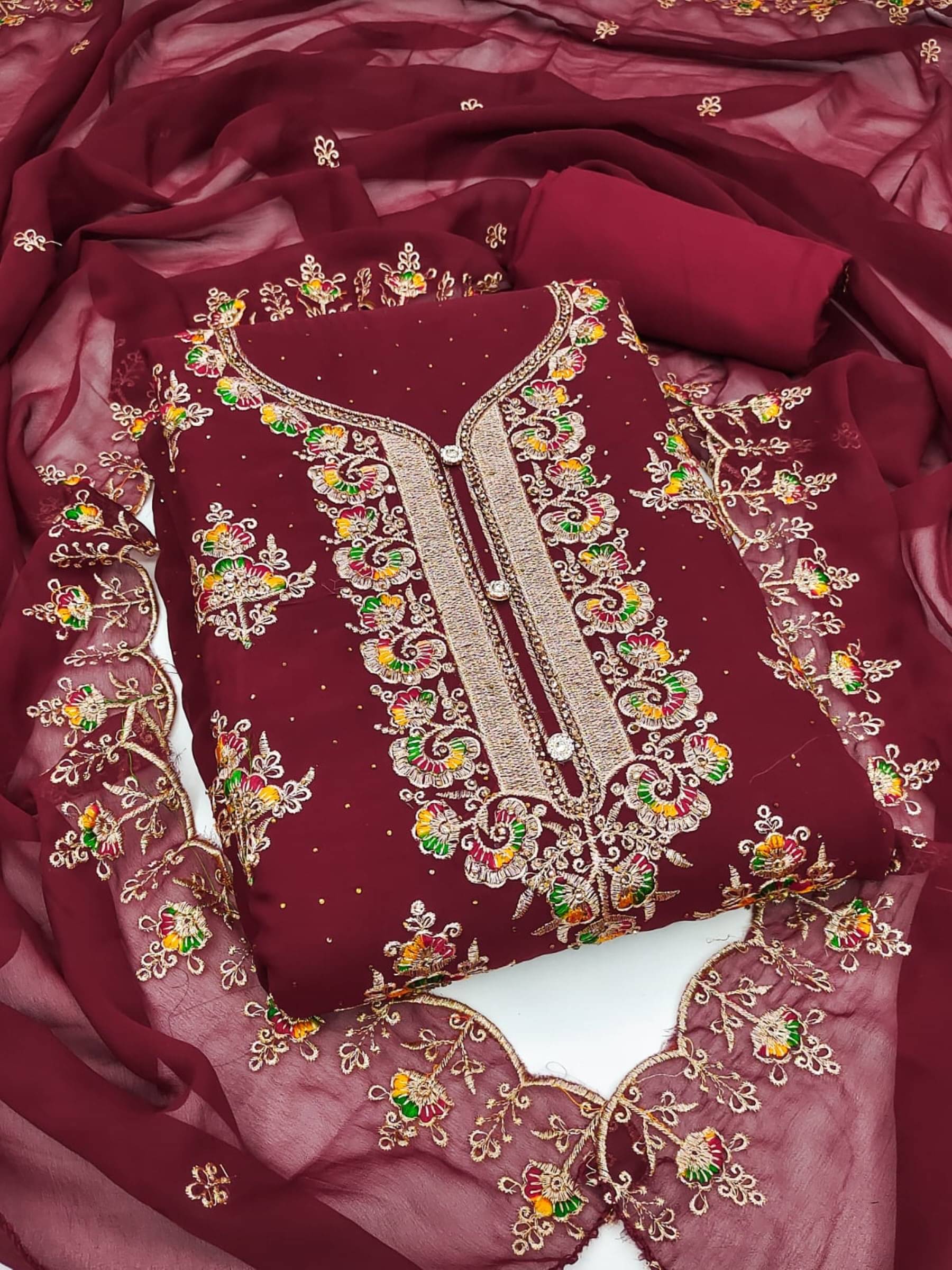 Rangtulika Ethnics Unstitched Georgette Embroidered Dress Material - Maroon ( Pack of 1 ) Rangtulika Ethnics Unstitched Georgette Embroidered Dress Material - Maroon ( Pack of 1 )