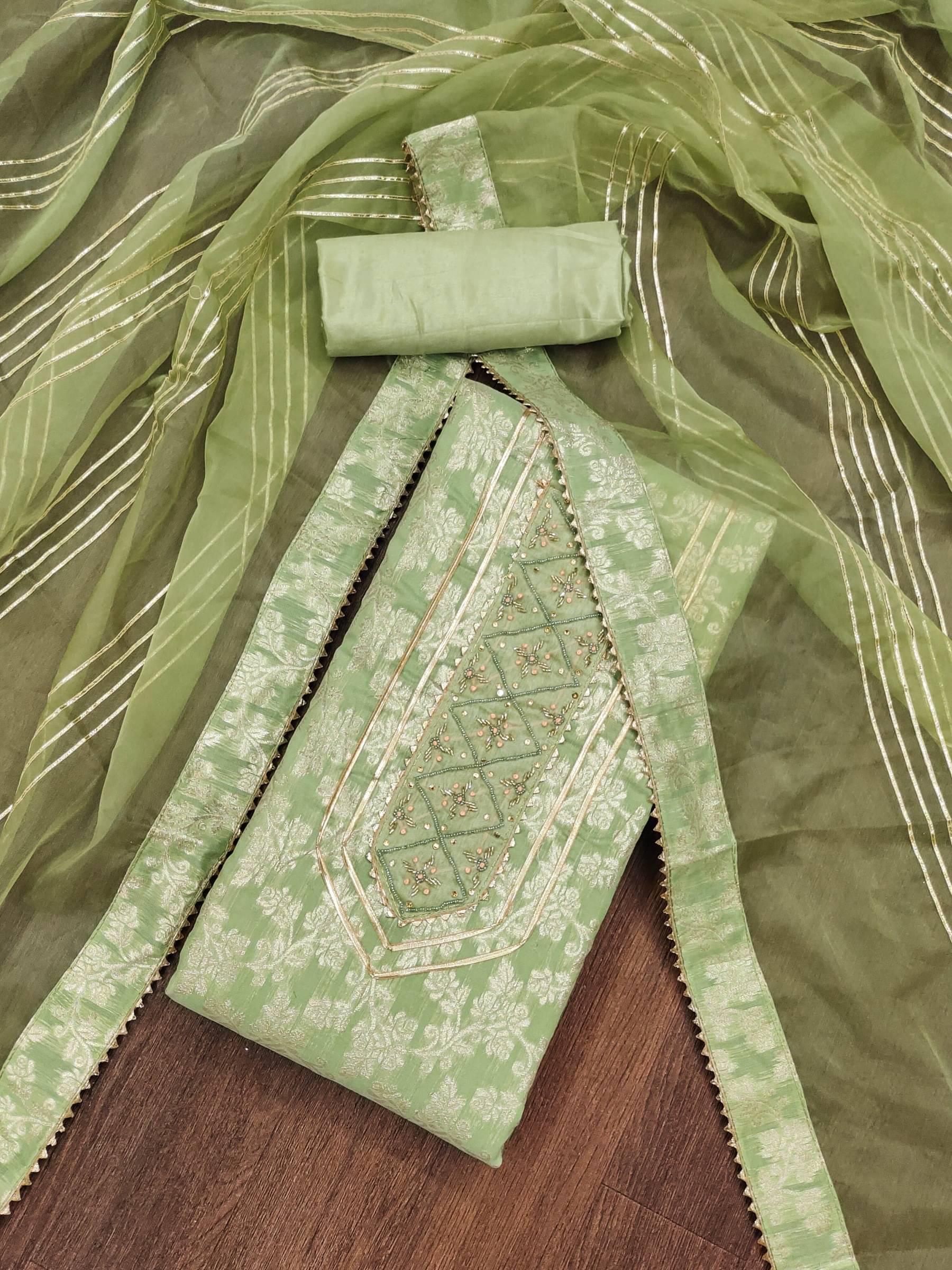 Rangtulika Ethnics Unstitched Jacquard Applique Dress Material - Green ( Pack of 1 )     			Rangtulika Ethnics Unstitched Jacquard Applique Dress Material - Green ( Pack of 1 )