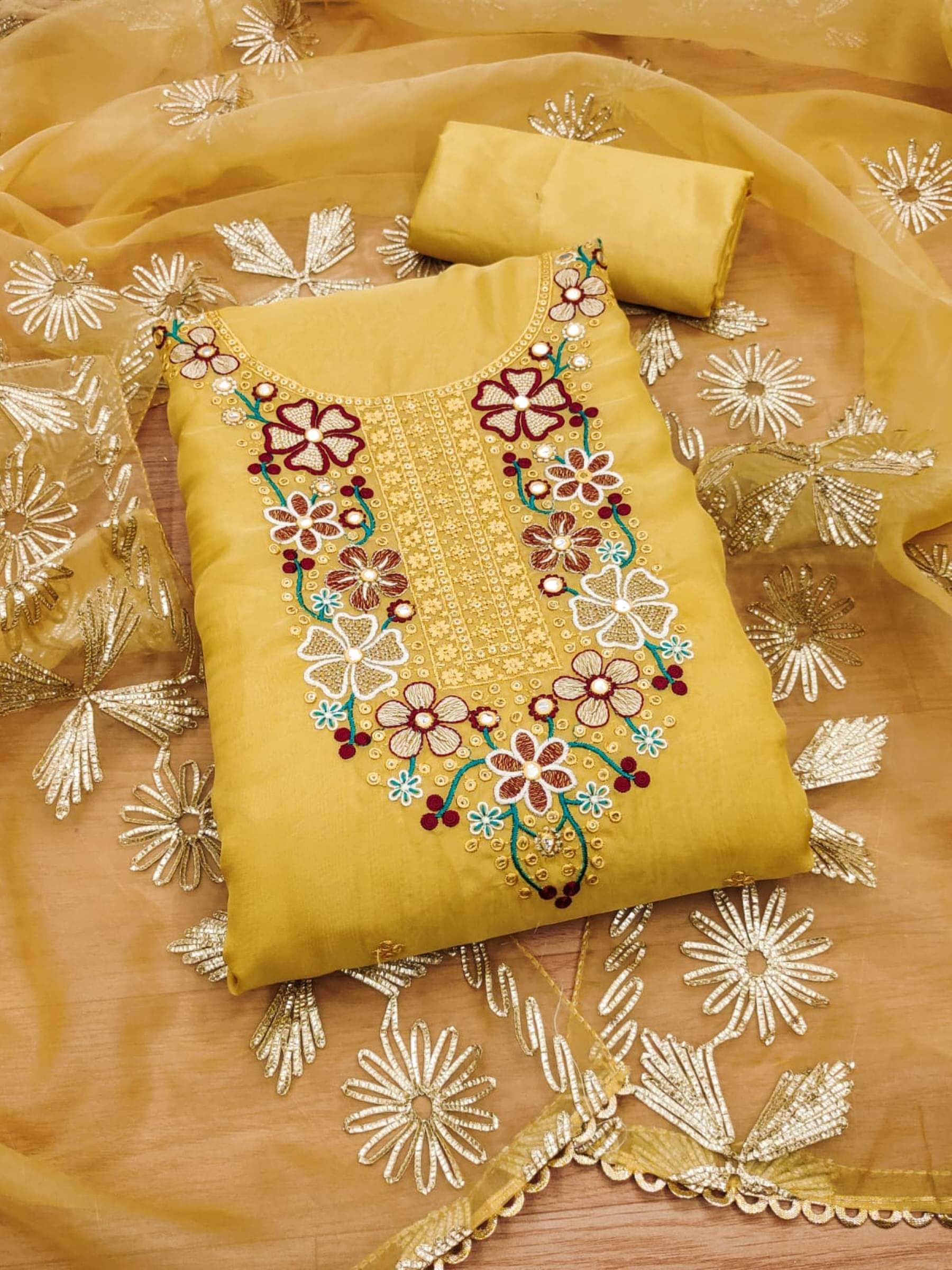     			Rangtulika Ethnics Unstitched Organza Embroidered Dress Material - Yellow ( Pack of 1 )