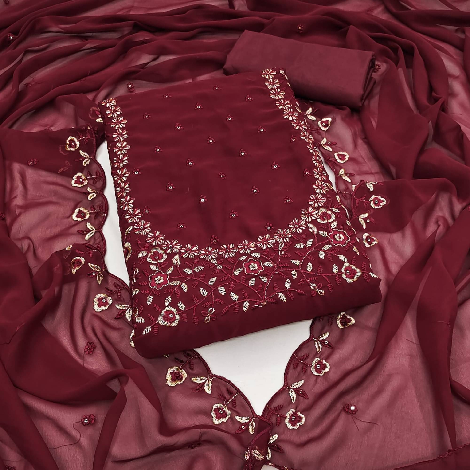     			Rangtulika Ethnics Unstitched Silk Blend Embroidered Dress Material - Maroon ( Pack of 1 )