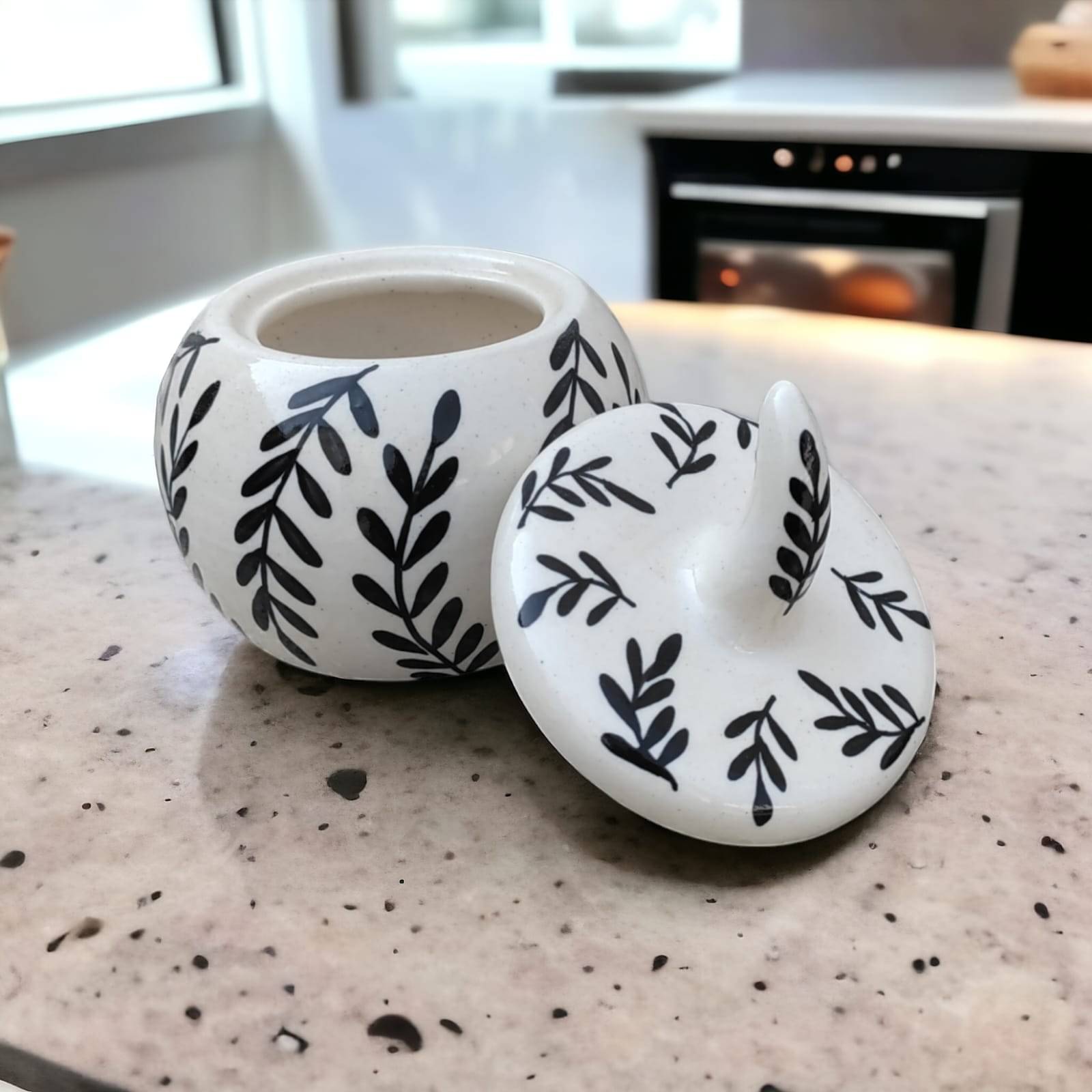 Malaikah Blk Leaf Salt Jar Ceramic Black Tea/Coffee/Sugar Container ( Set of 1 ) Malaikah Blk Leaf Salt Jar Ceramic Black Tea/Coffee/Sugar Container ( Set of 1 )