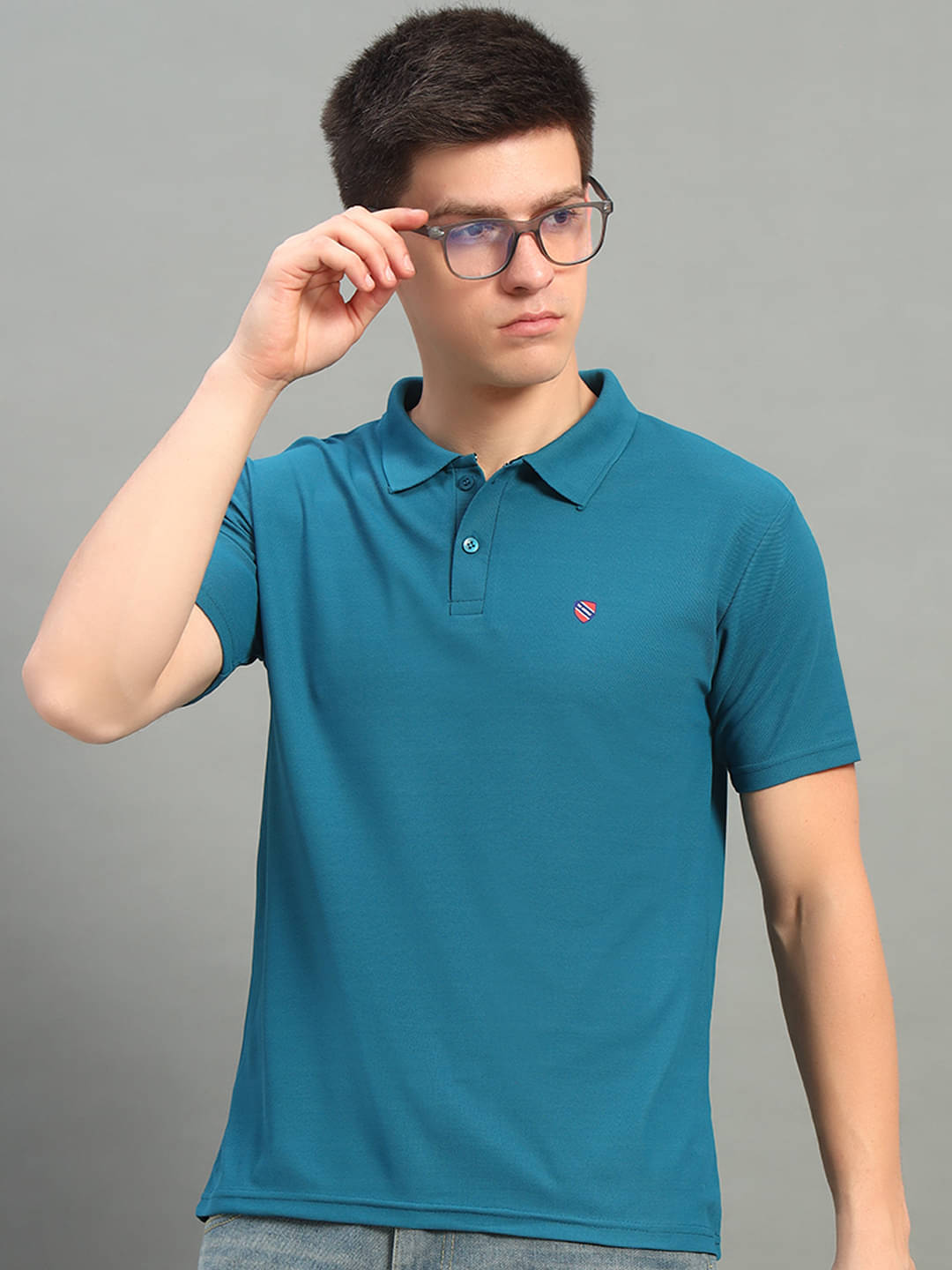 THE CASUALS Pack of 1 Cotton Blend Regular Fit Solid Half Sleeves Men's Polo T Shirt ( Teal Blue )     			THE CASUALS Pack of 1 Cotton Blend Regular Fit Solid Half Sleeves Men's Polo T Shirt ( Teal Blue )