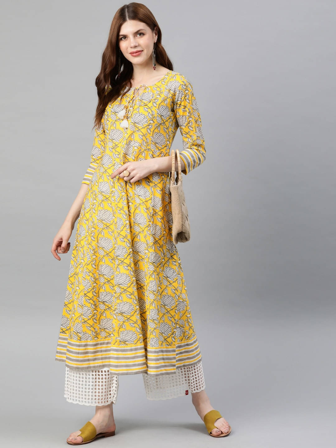     			Yash Gallery Pack of 1 Cotton Printed Flared Women's Kurti - ( Yellow )