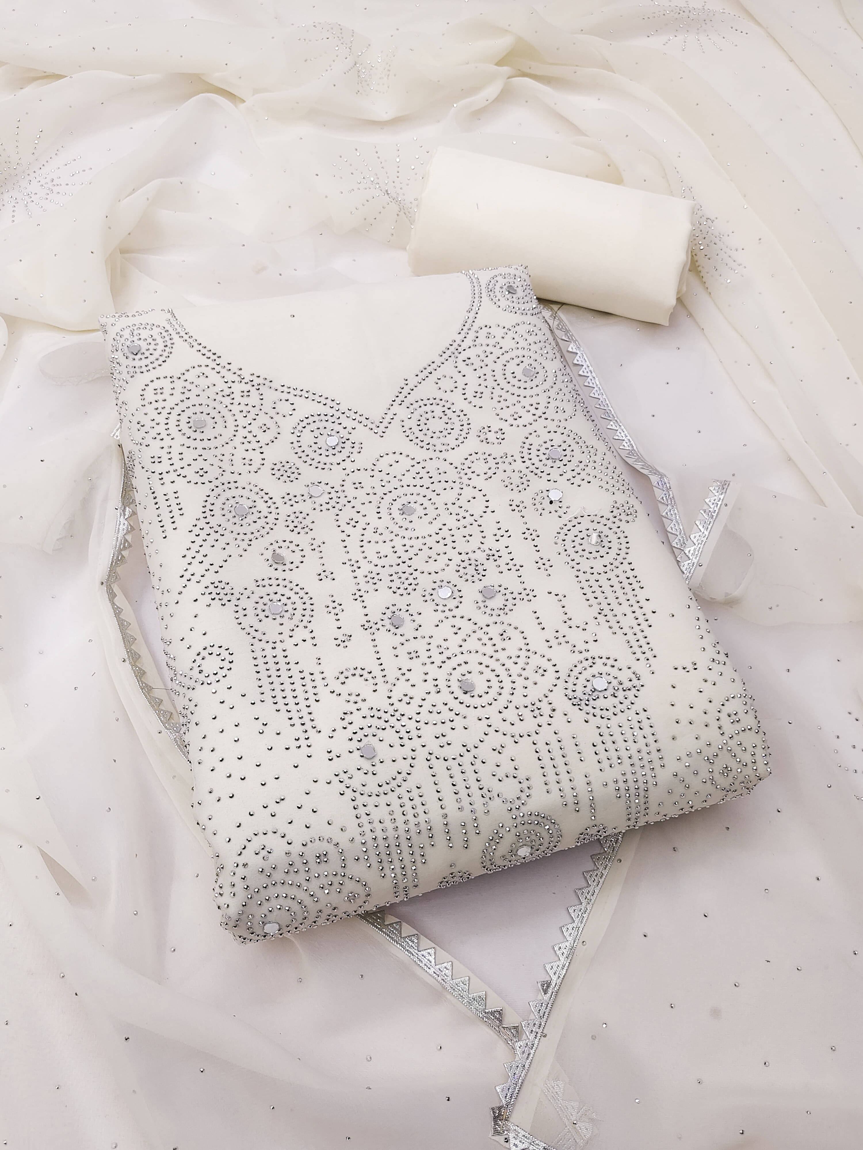 Nayanthara Trends Unstitched Georgette Embellished Dress Material - White ( Pack of 1 ) Nayanthara Trends Unstitched Georgette Embellished Dress Material - White ( Pack of 1 )