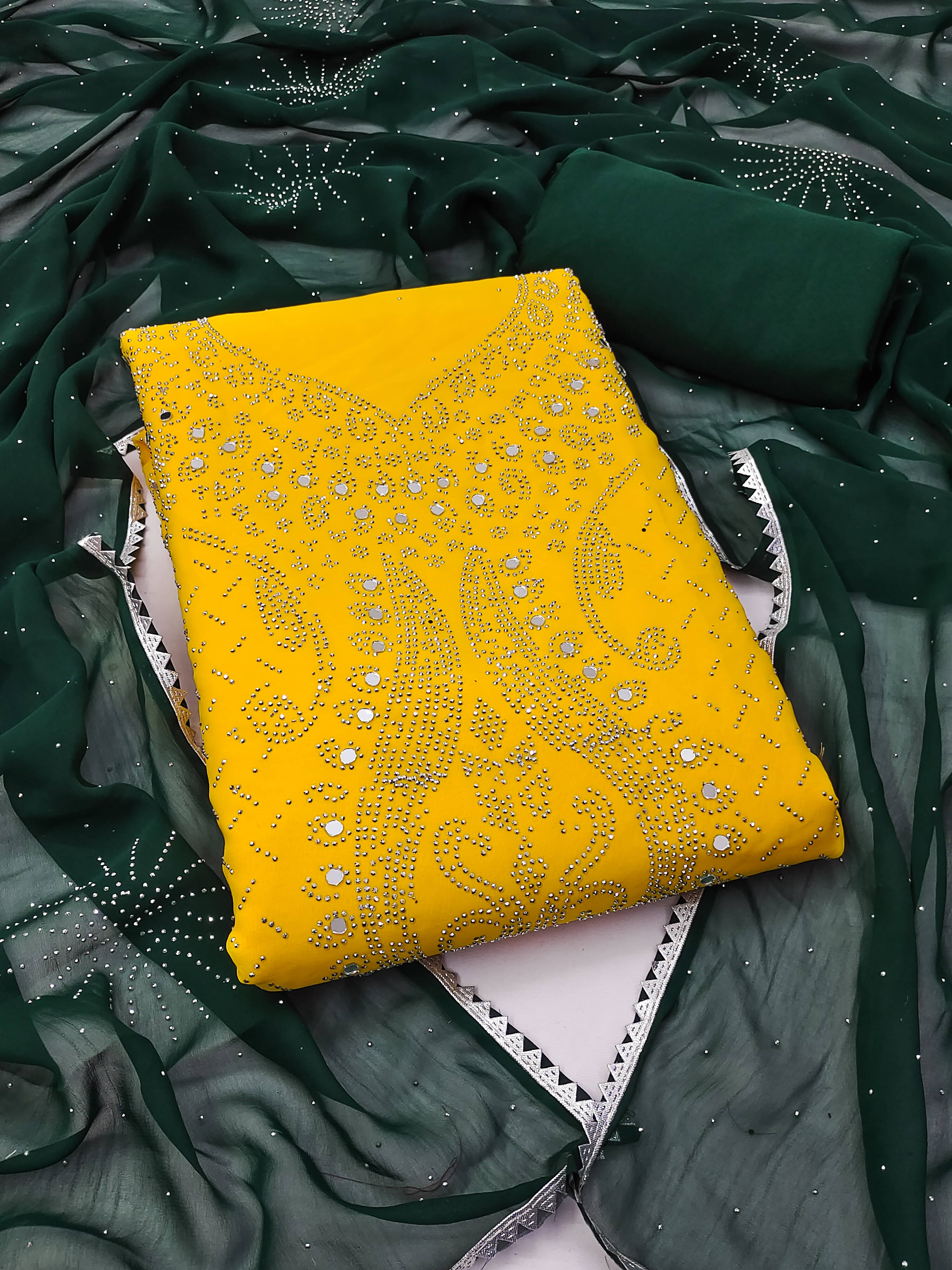 Nayanthara Trends Unstitched Georgette Embellished Dress Material - Yellow ( Pack of 1 ) Nayanthara Trends Unstitched Georgette Embellished Dress Material - Yellow ( Pack of 1 )