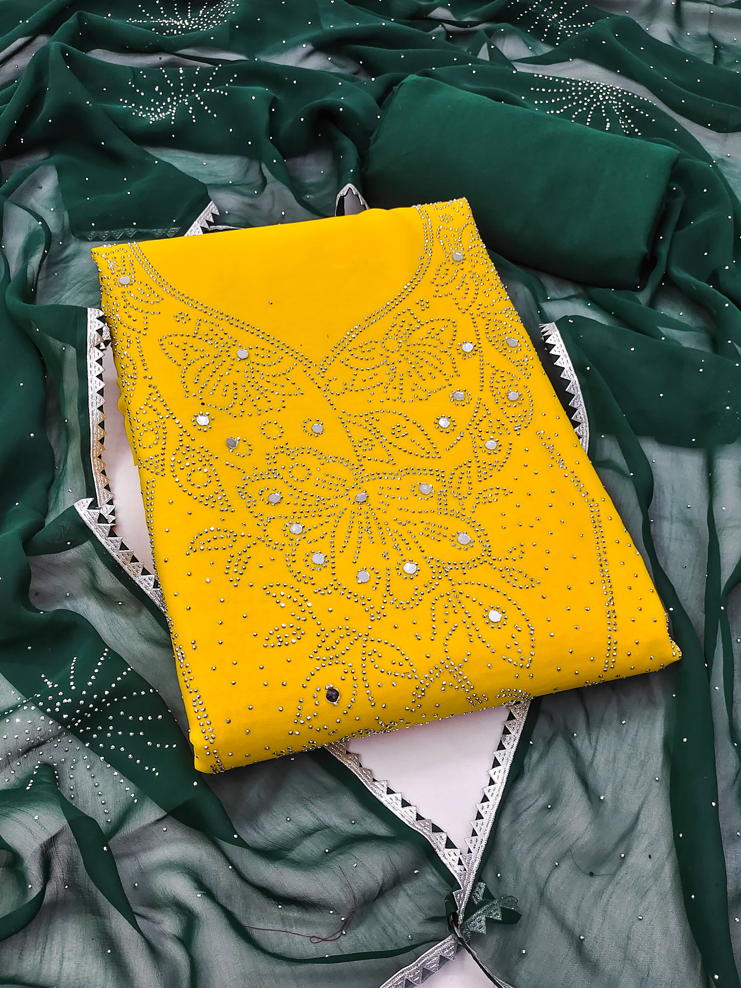 Nayanthara Trends Unstitched Georgette Embellished Dress Material - Yellow ( Pack of 1 ) Nayanthara Trends Unstitched Georgette Embellished Dress Material - Yellow ( Pack of 1 )
