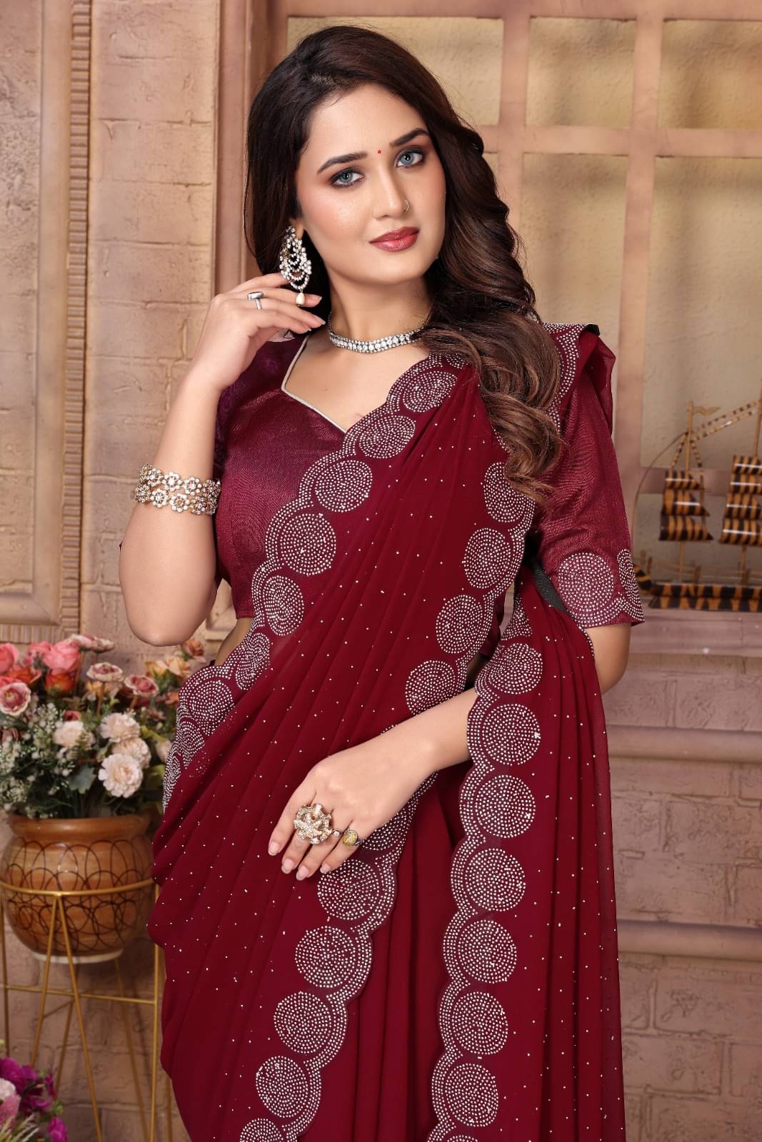     			DEBRIS FAB Georgette Embellished Saree With Unstitched Blouse Piece ( Maroon )