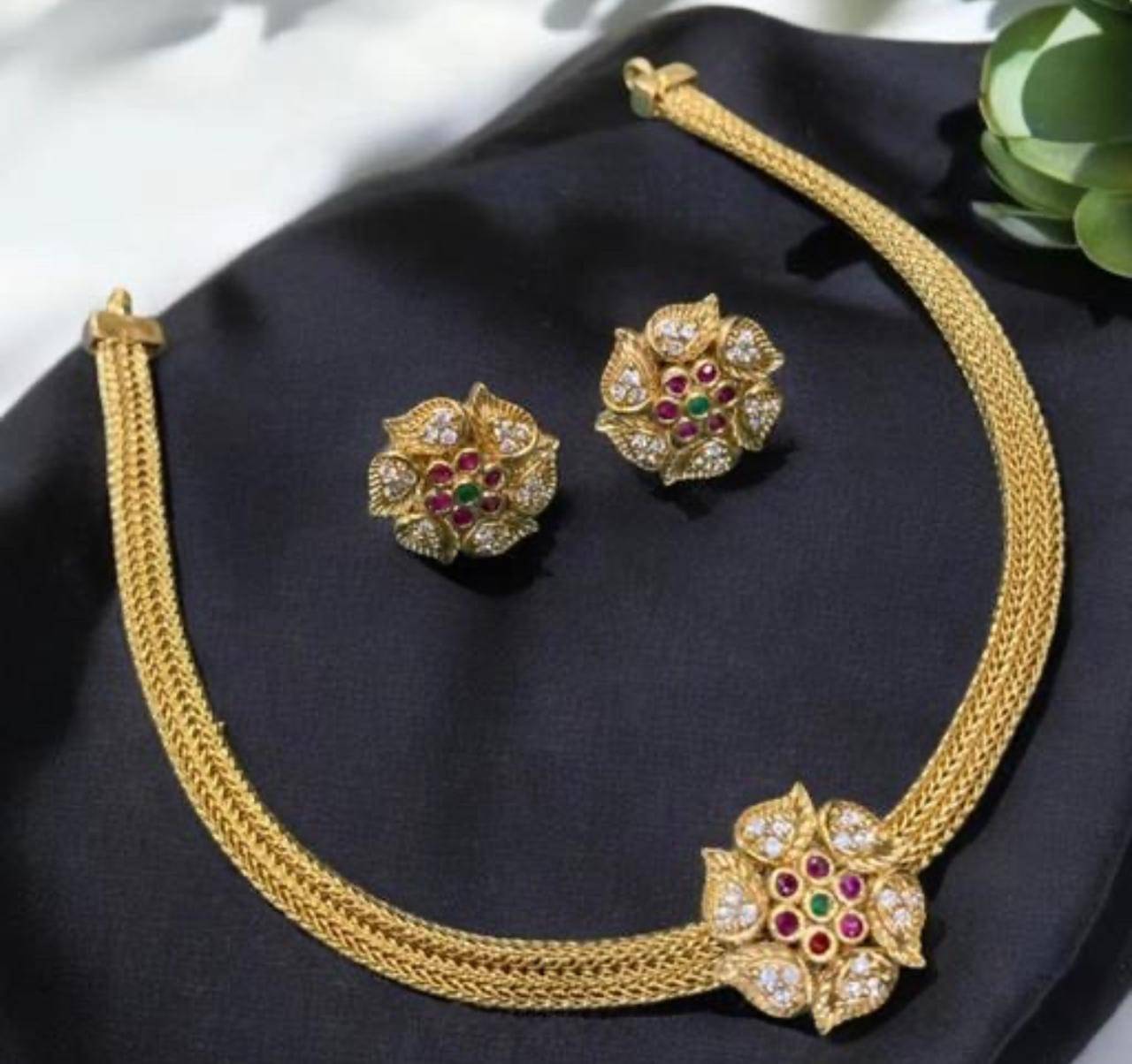     			KC JEWELS Multi Color Brass Necklace Set ( Pack of 1 )