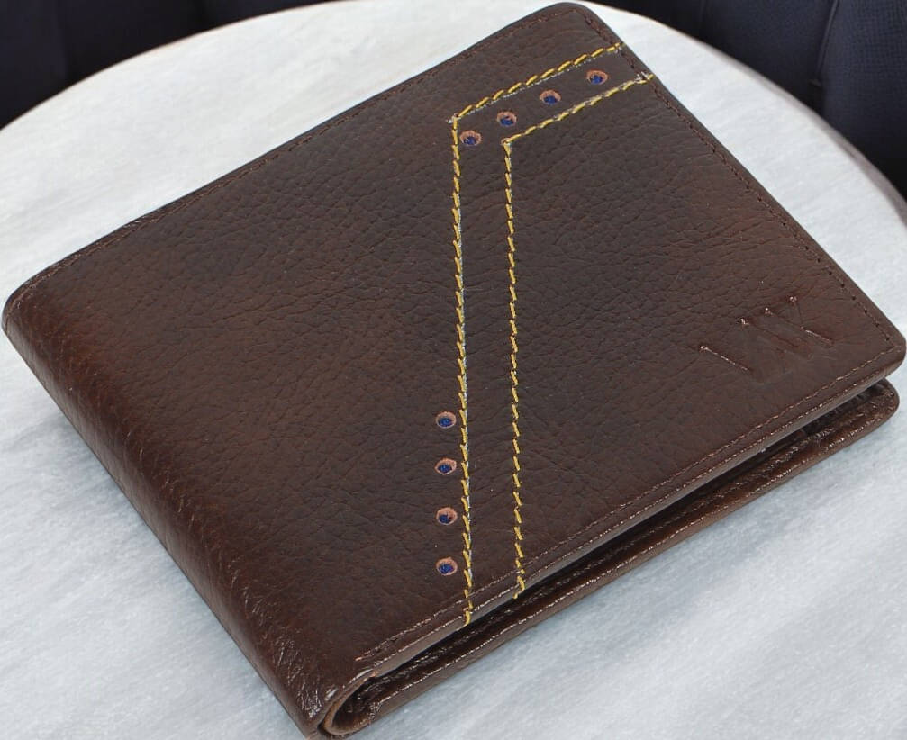 WILDAUK 100% Leather Self Design Men's Regular Wallet With More Than 10 Slots For Card ( Brown , Pack of 1 )     			WILDAUK 100% Leather Self Design Men's Regular Wallet With More Than 10 Slots For Card ( Brown , Pack of 1 )