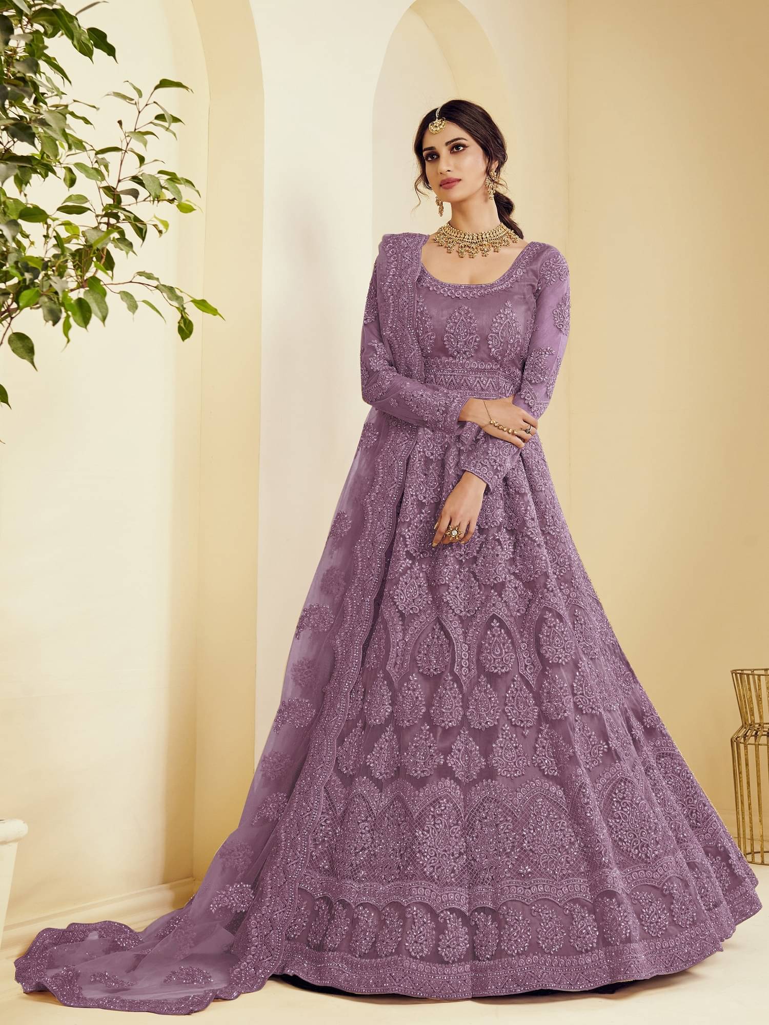 Aika Mauve Flared Net Women's Semi Stitched Ethnic Gown ( Pack of 1 ) Aika Mauve Flared Net Women's Semi Stitched Ethnic Gown ( Pack of 1 )