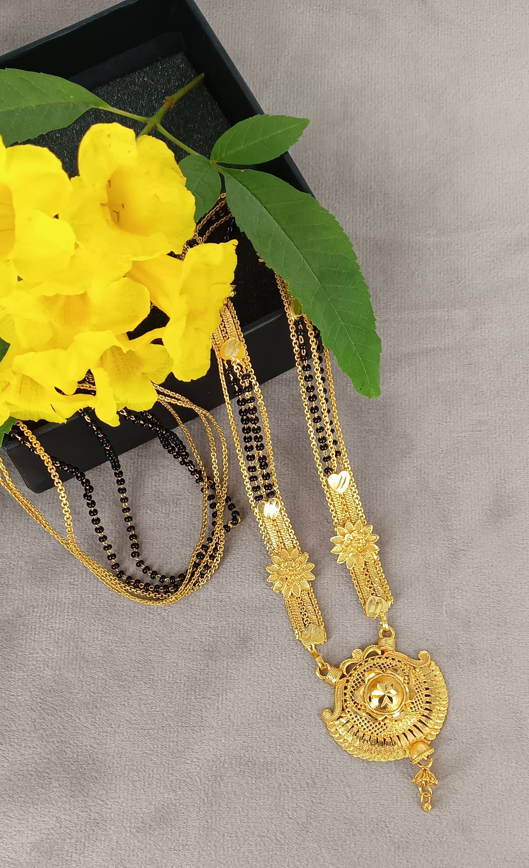 RANEM Golden Mangalsutra ( Pack of 1 )     			RANEM Golden Mangalsutra ( Pack of 1 )