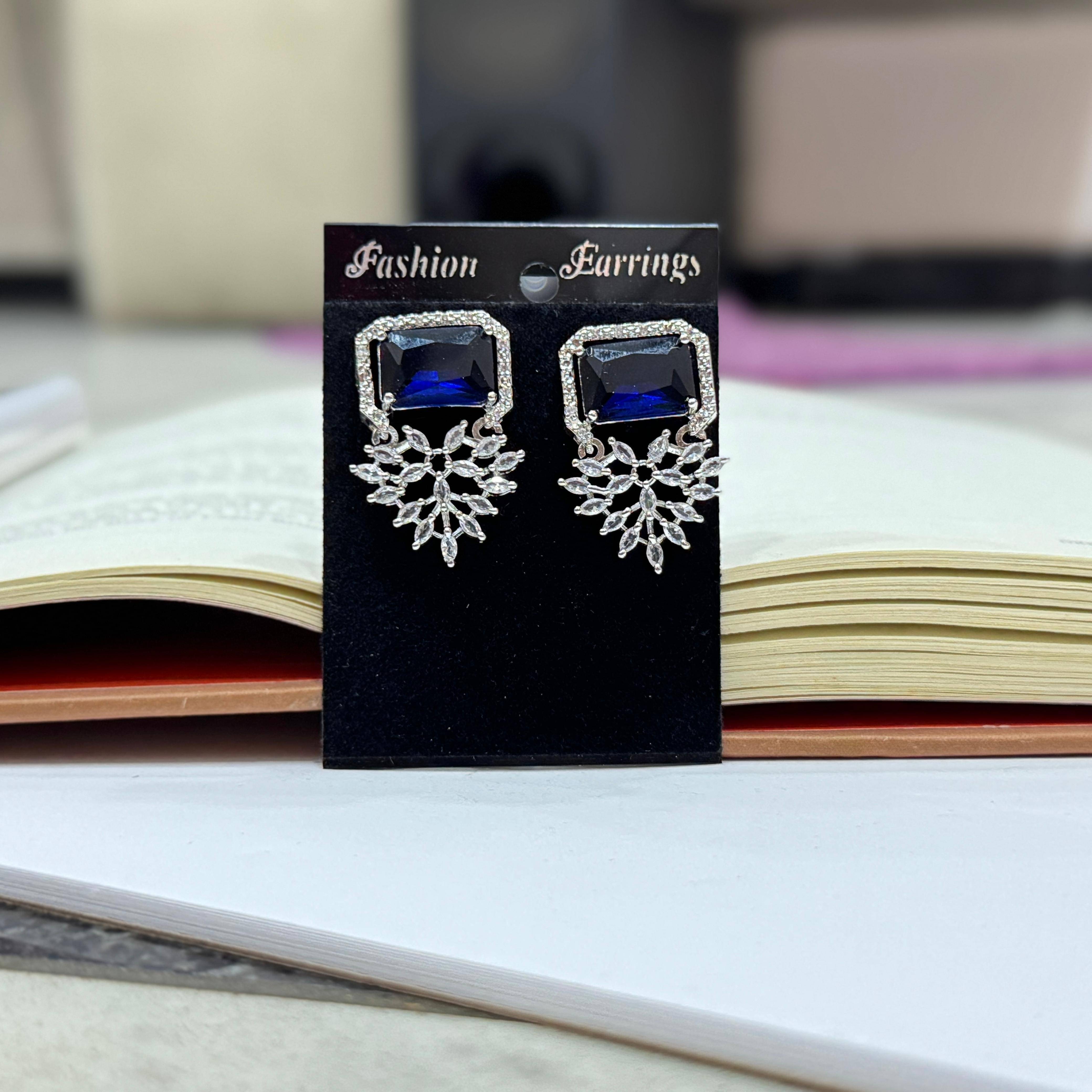     			AKLINA Blue Jhumki Earrings ( Pack of 1 )