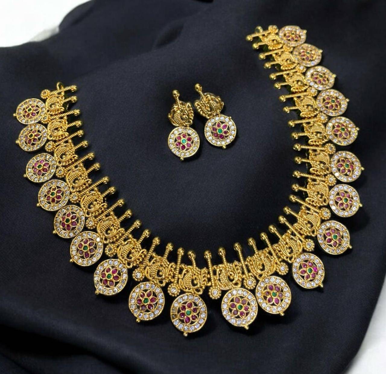     			KC JEWELS Multi Color Brass Necklace Set ( Pack of 1 )
