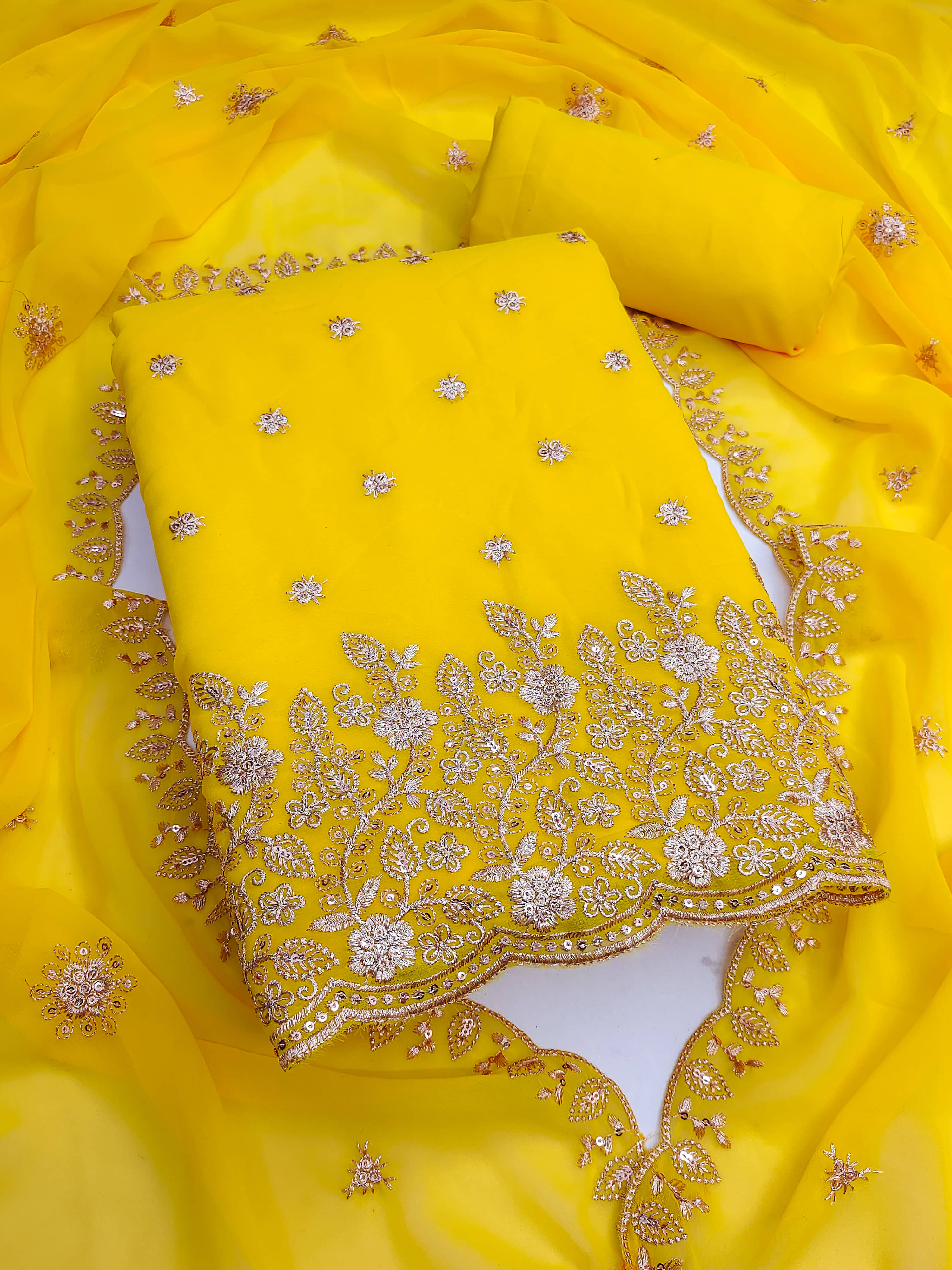     			Nayanthara Trends Unstitched Georgette Embroidered Dress Material - Yellow ( Pack of 1 )