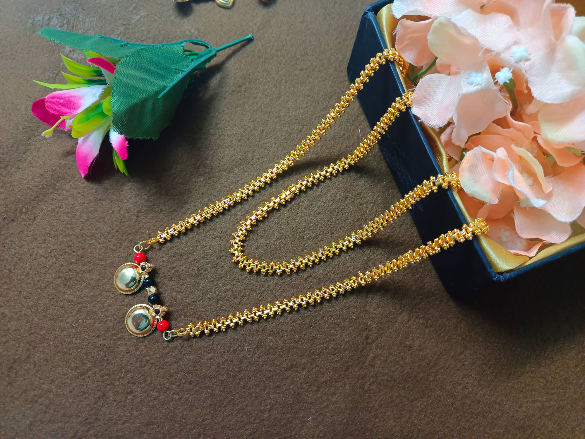 RANEM Golden Mangalsutra ( Pack of 1 )     			RANEM Golden Mangalsutra ( Pack of 1 )