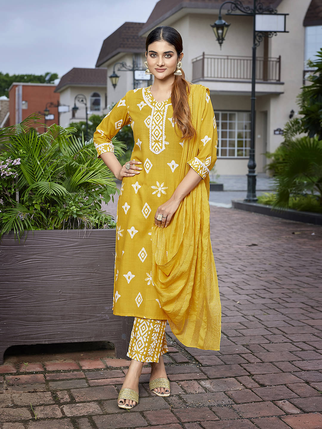 Royal Export Cotton Blend Printed Kurti With Pants Women's Stitched Salwar Suit - Mustard ( Pack of 1 ) Royal Export Cotton Blend Printed Kurti With Pants Women's Stitched Salwar Suit - Mustard ( Pack of 1 )