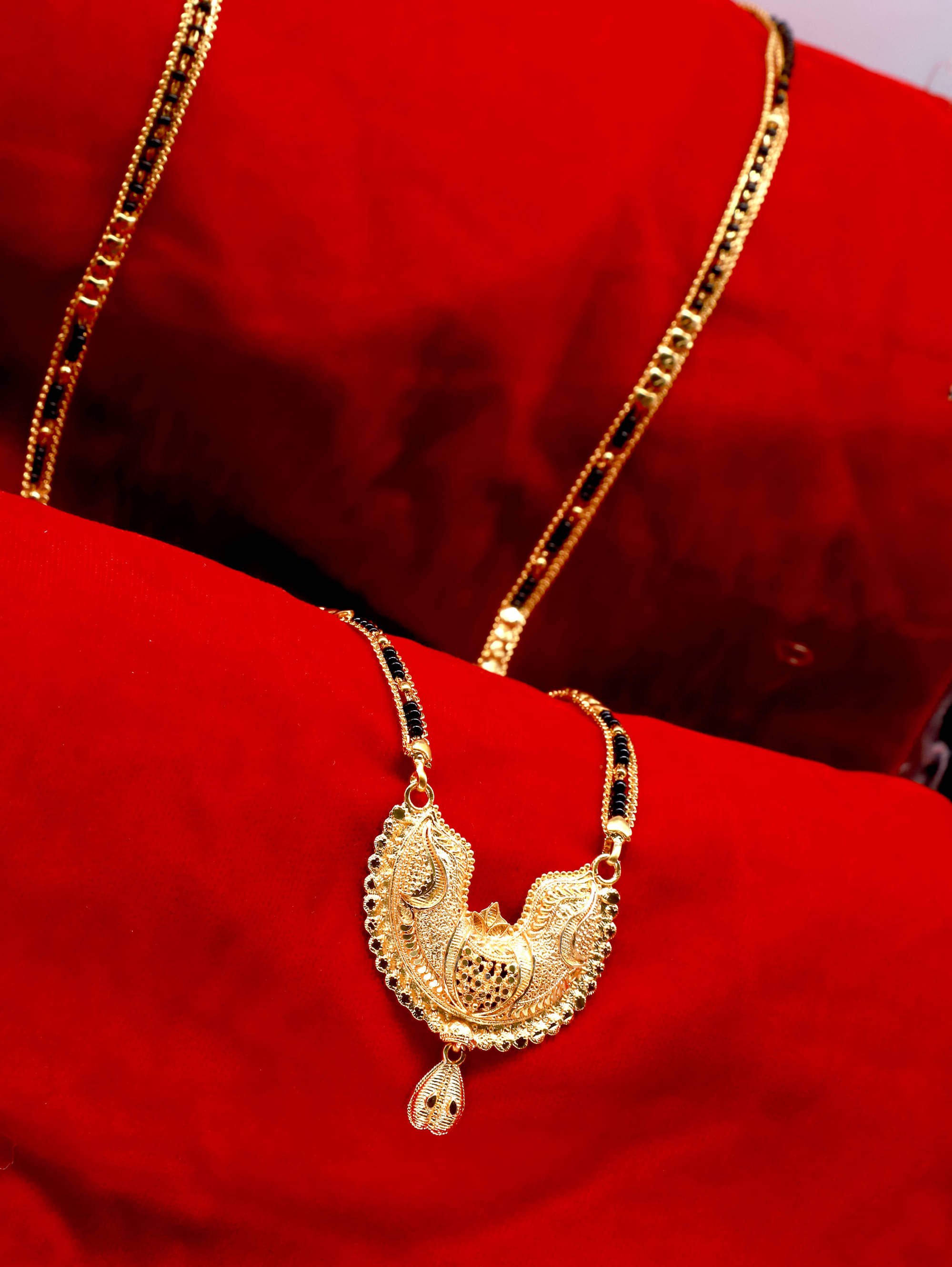     			RANEM Golden Mangalsutra ( Pack of 1 )