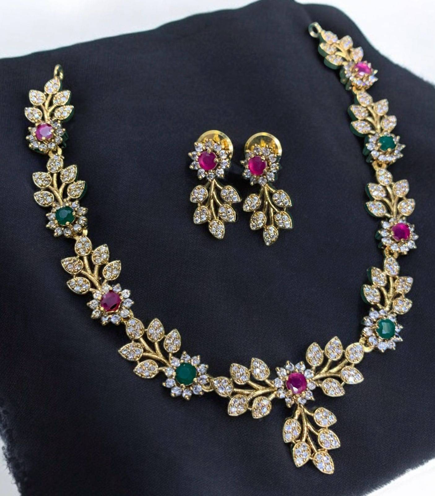     			KC JEWELS Multi Color Brass Necklace Set ( Pack of 1 )