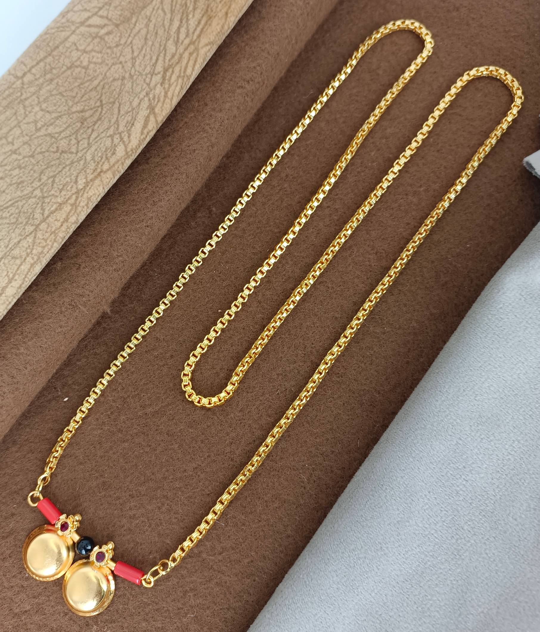 RANEM Golden Mangalsutra ( Pack of 1 )     			RANEM Golden Mangalsutra ( Pack of 1 )