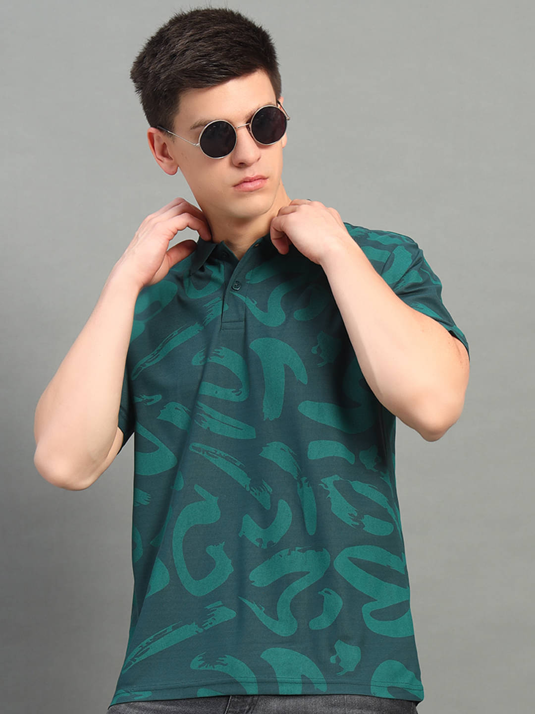 renuovo Pack of 1 Cotton Blend Regular Fit Printed Half Sleeves Men's Polo T Shirt ( Dark Green )     			renuovo Pack of 1 Cotton Blend Regular Fit Printed Half Sleeves Men's Polo T Shirt ( Dark Green )