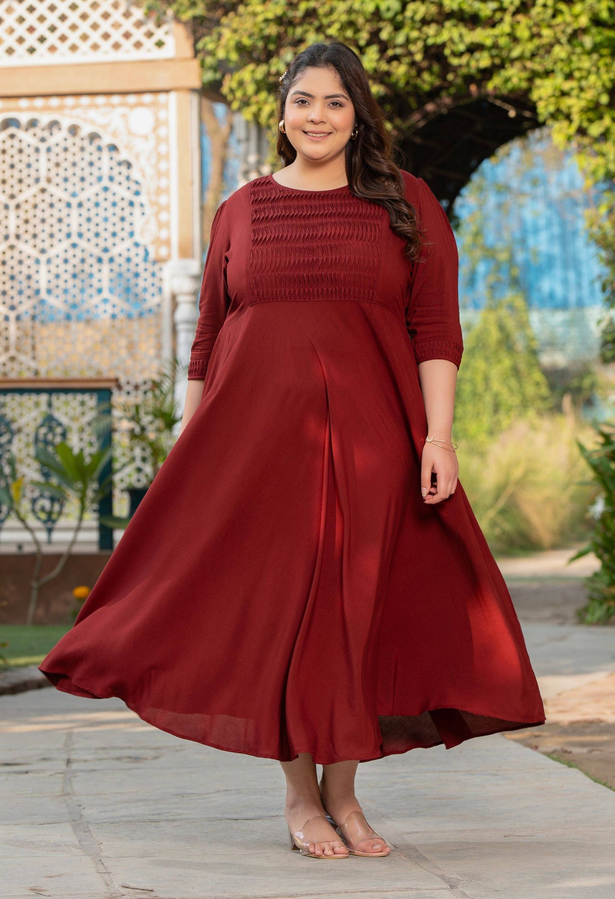     			PrettyPlus by Desinoor.com Women Viscose Rayon Solid Fit & Flare Dress ( Rust )