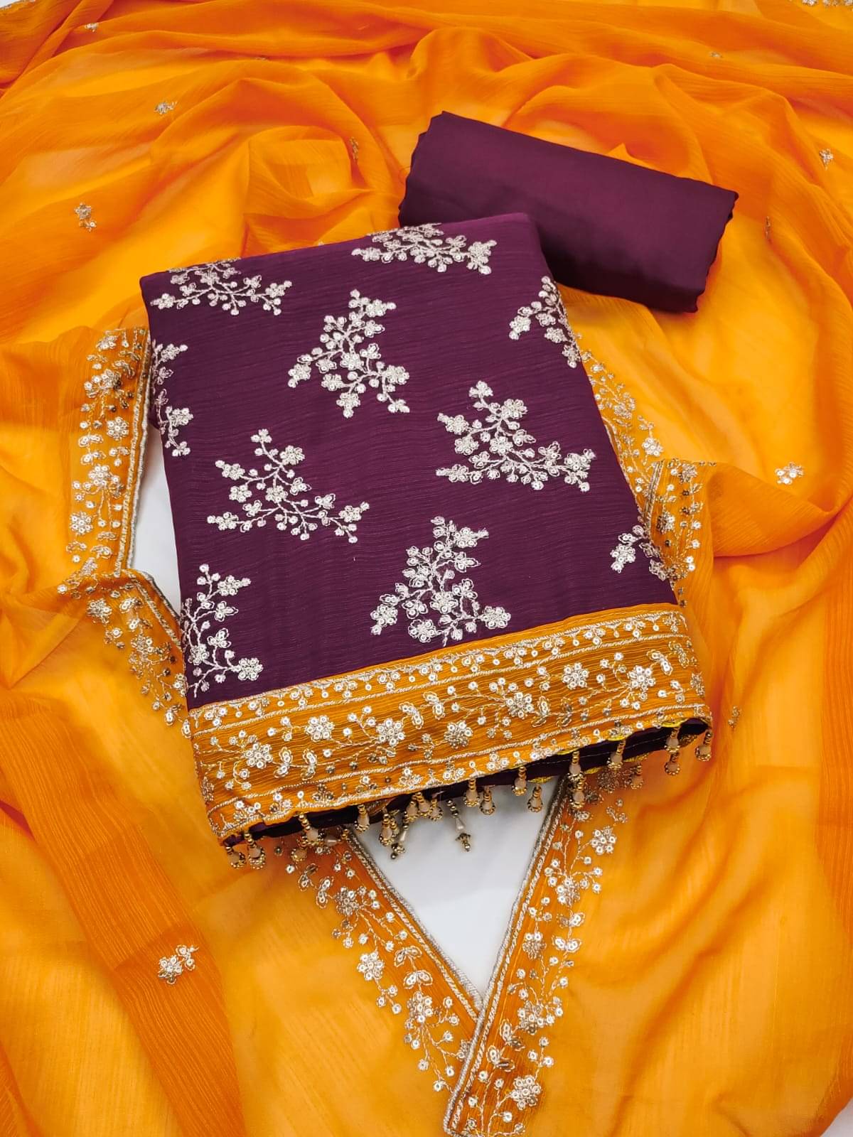 HL SILKMILLS Unstitched Georgette Embroidered Dress Material - Purple,Yellow ( Pack of 1 ) HL SILKMILLS Unstitched Georgette Embroidered Dress Material - Purple,Yellow ( Pack of 1 )