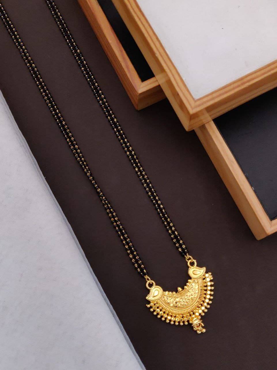 Shivay Fashion Golden Mangalsutra ( Pack of 1 )     			Shivay Fashion Golden Mangalsutra ( Pack of 1 )