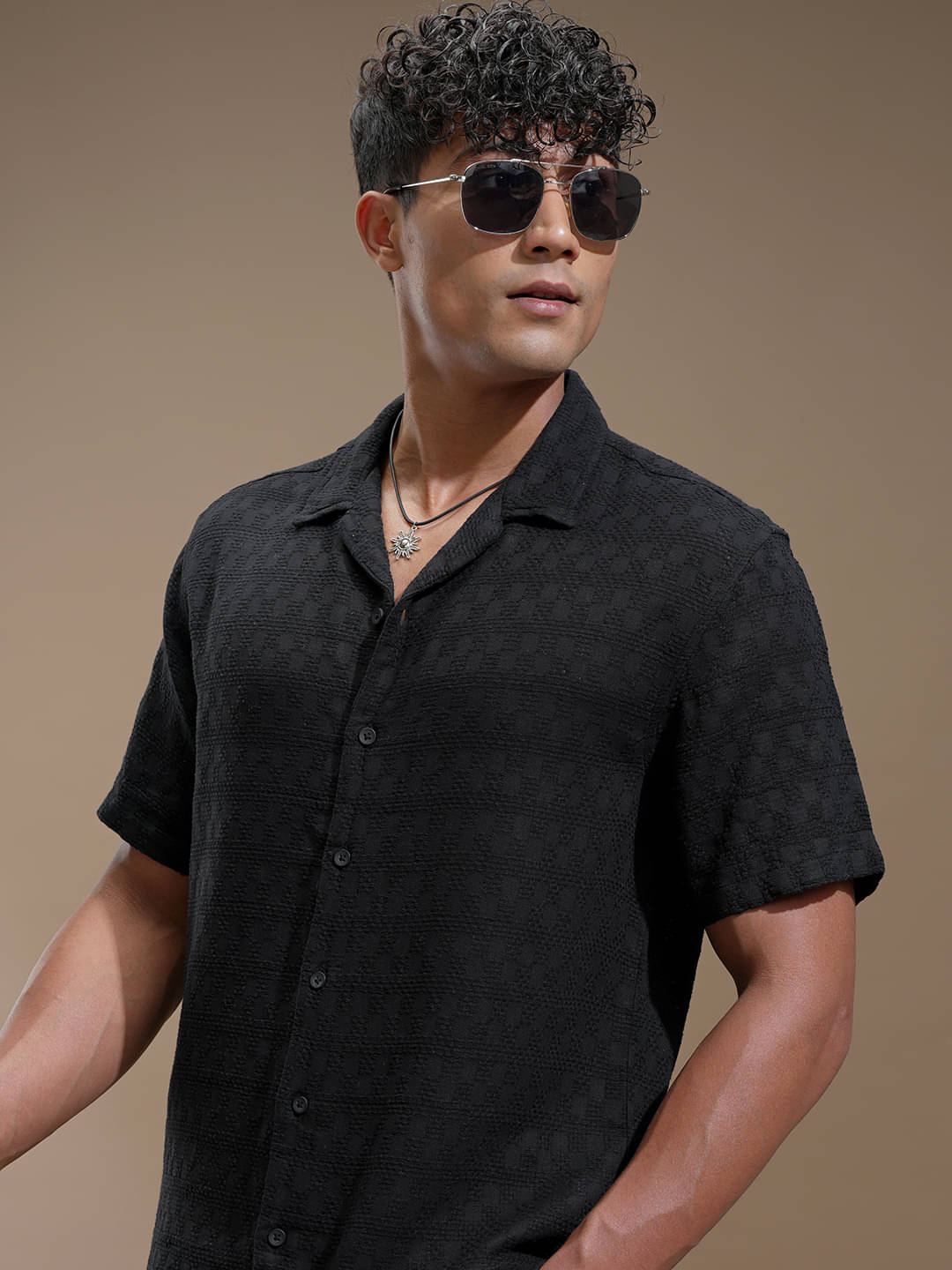 Highlander 100% Cotton Relaxed Fit Self Design Half Sleeves Men's Casual Shirt - Black ( Pack of 1 )     			Highlander 100% Cotton Relaxed Fit Self Design Half Sleeves Men's Casual Shirt - Black ( Pack of 1 )