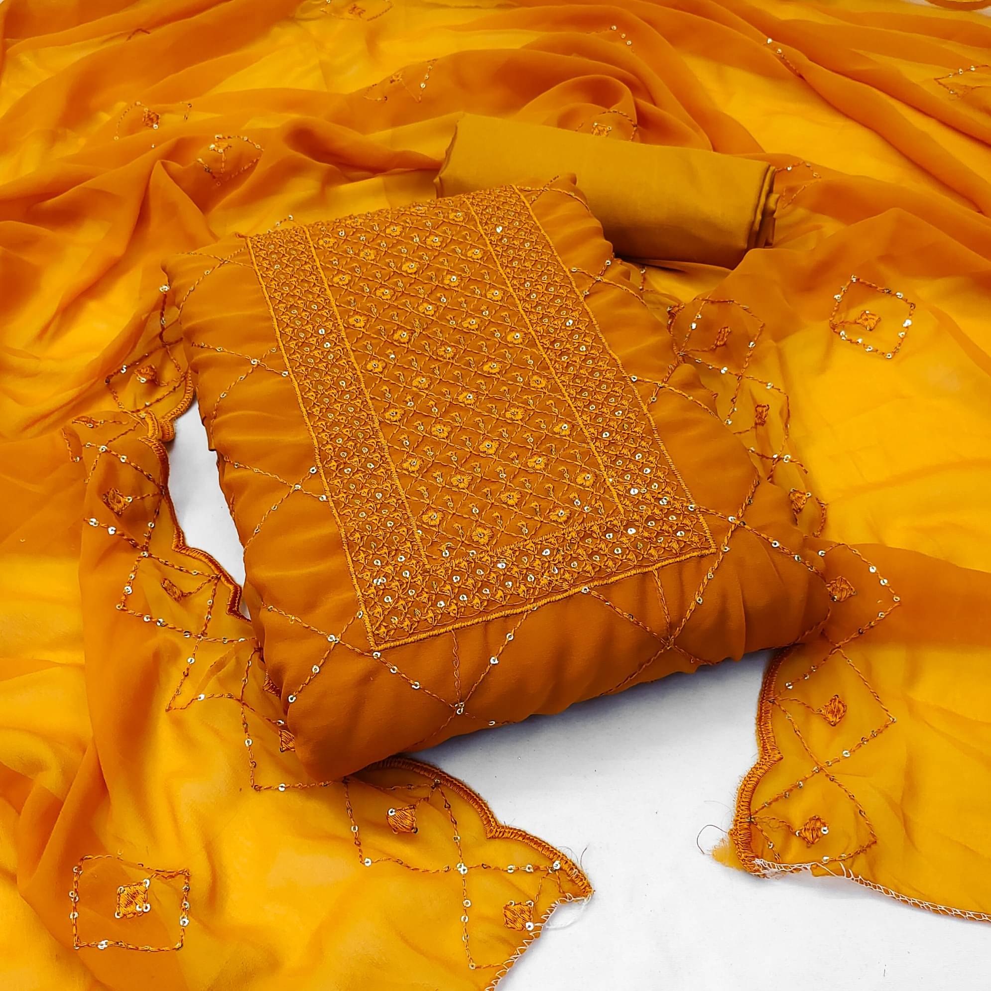     			Rangtulika Ethnics Women Georgette Unstitched Dress Material ( Orange )