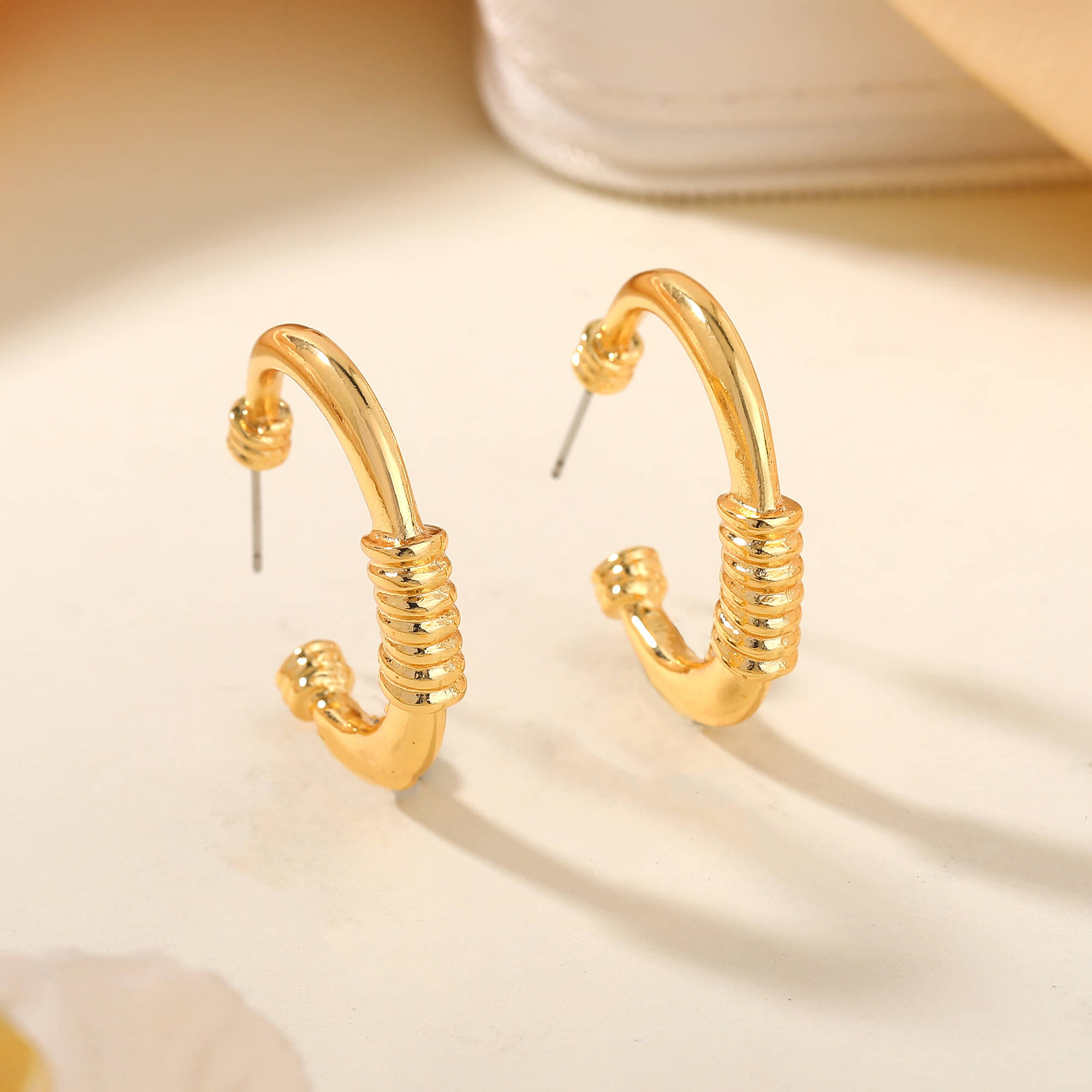     			Estele Golden Hoops Earrings ( Pack of 1 )