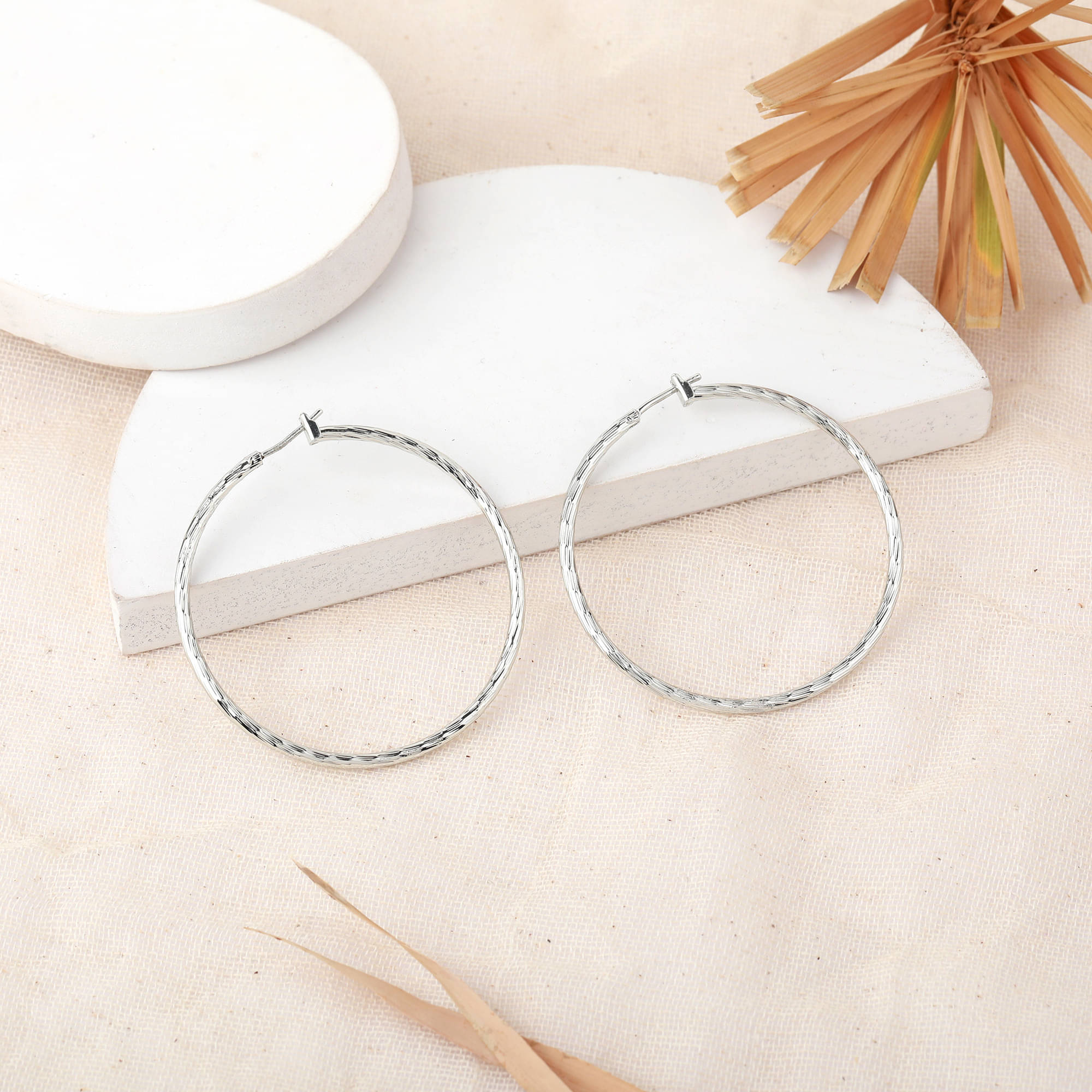     			Estele Silver Hoops Earrings ( Pack of 1 )