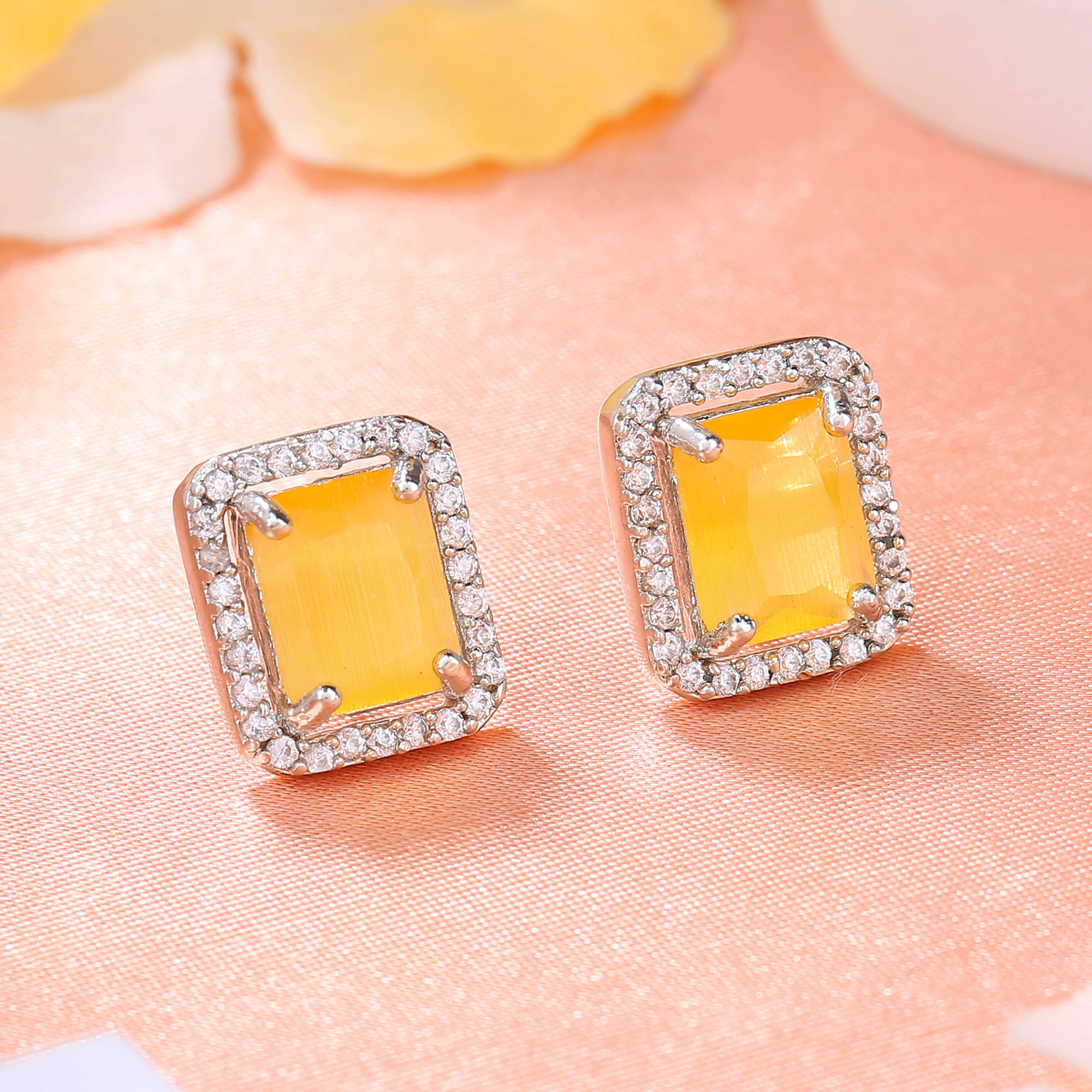     			Estele Yellow Stud Earrings ( Pack of 1 )