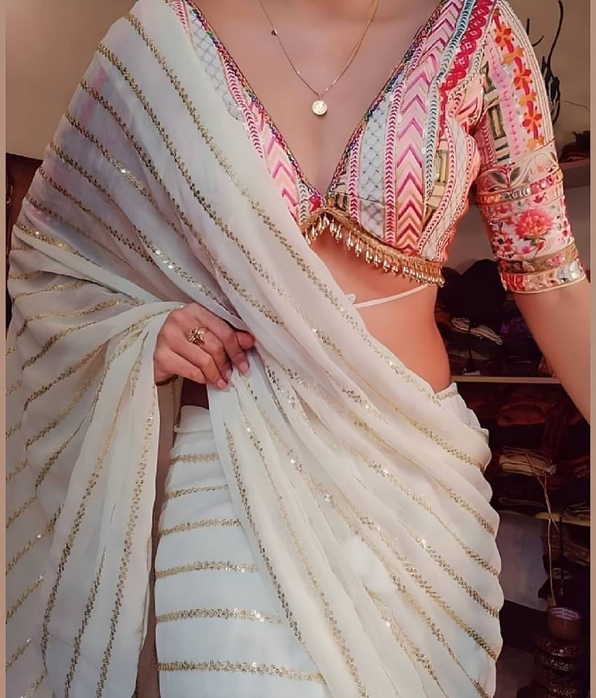     			krishna trends Georgette Embellished Saree With Unstitched Blouse Piece ( White )