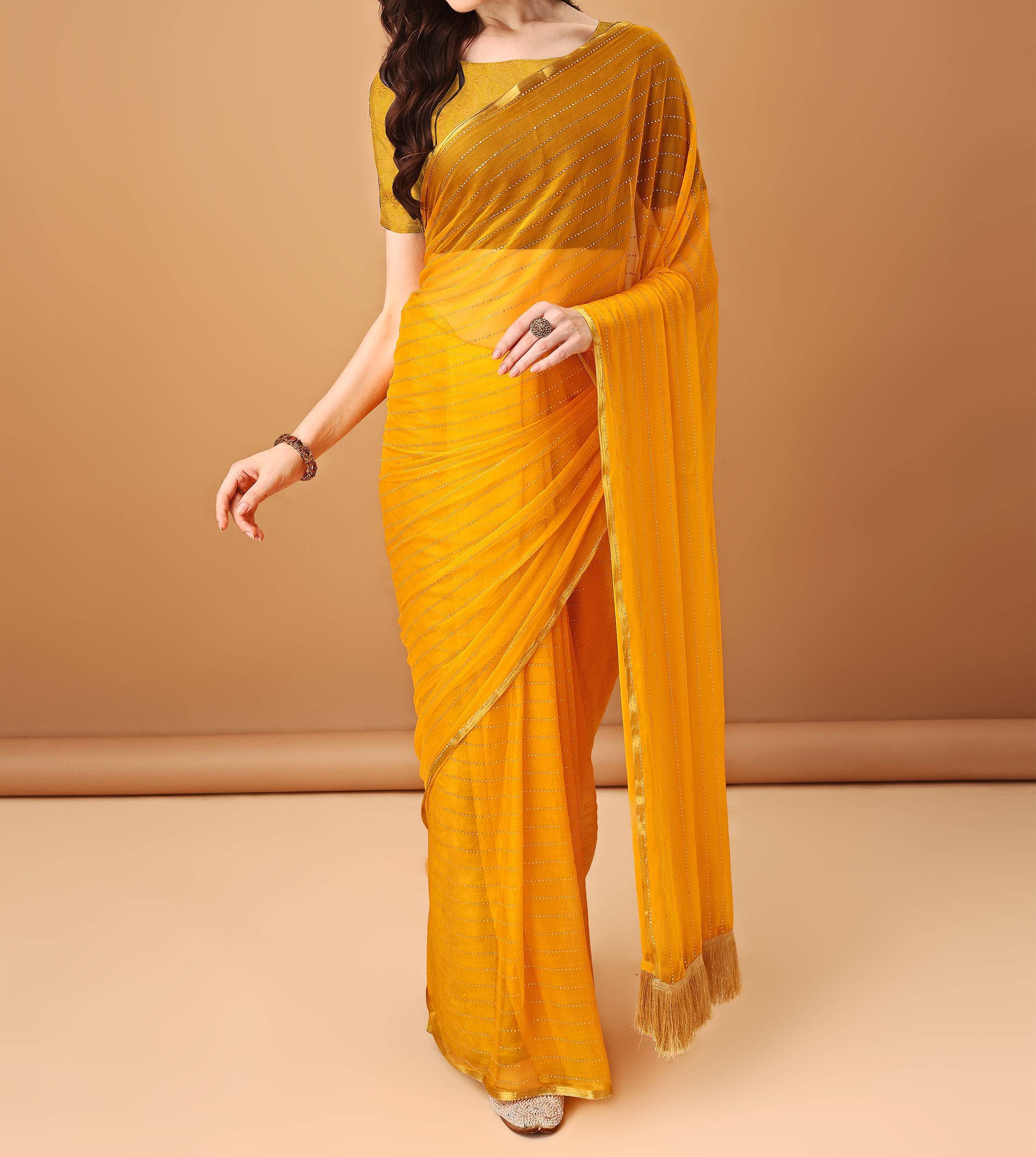 Parmila Fashion Chiffon Embellished Saree With Unstitched Blouse Piece ( Gold )     			Parmila Fashion Chiffon Embellished Saree With Unstitched Blouse Piece ( Gold )