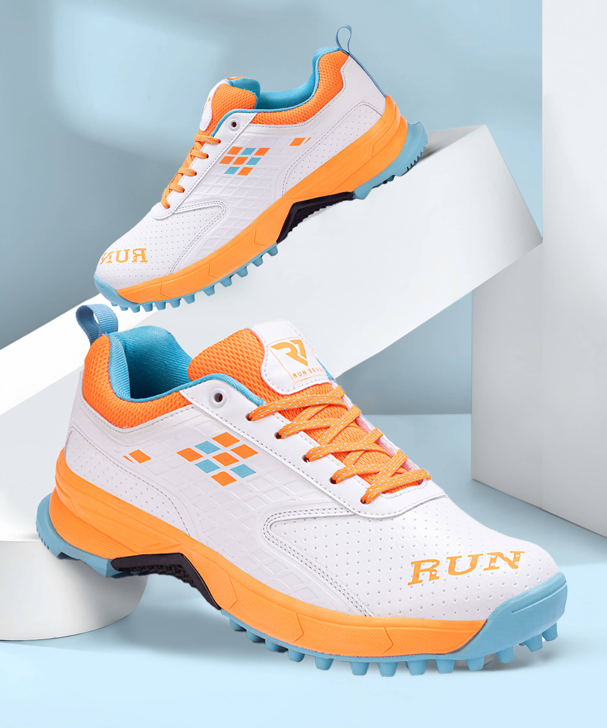 RUN SEVEN Orange Cricket Shoes - Sports Shoes | Buy online on ZillyBuy