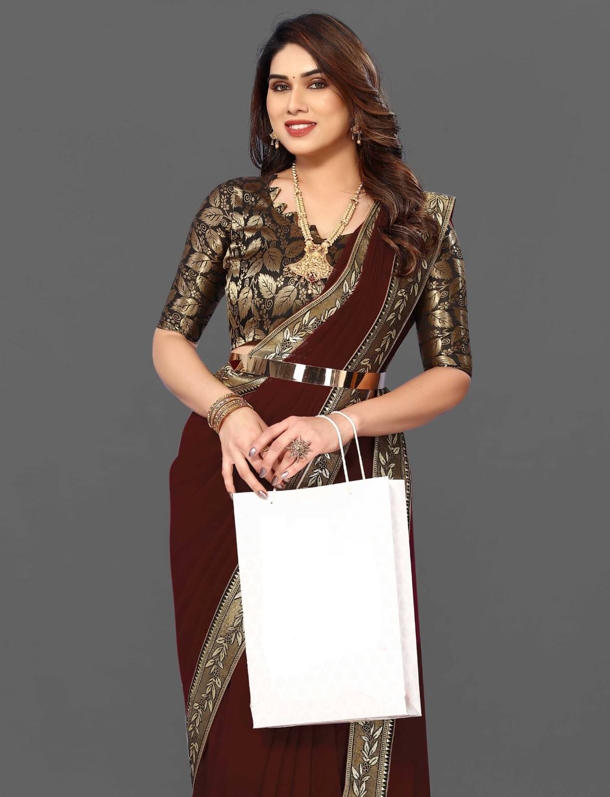     			DEBRIS FAB Georgette Embroidered Saree With Unstitched Blouse Piece ( Brown )