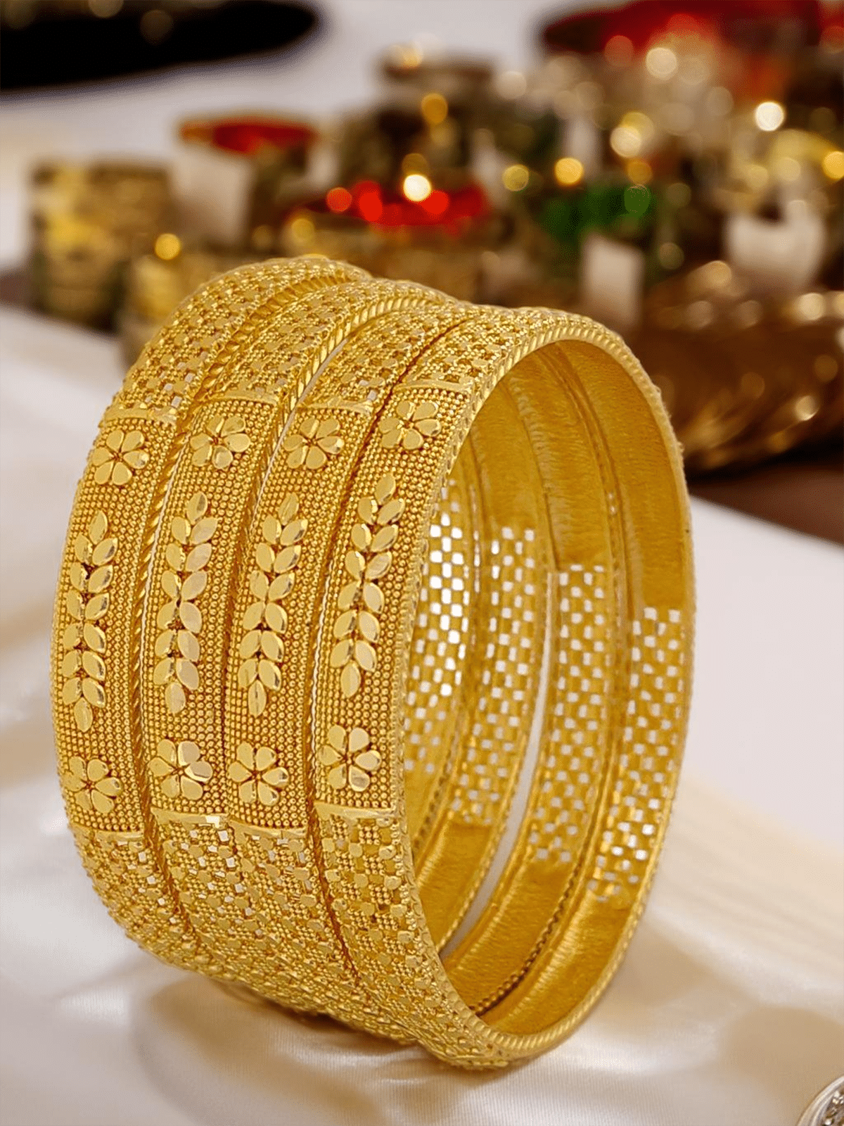     			Jewels Kafe Gold Bangle Set ( Pack of 4 )