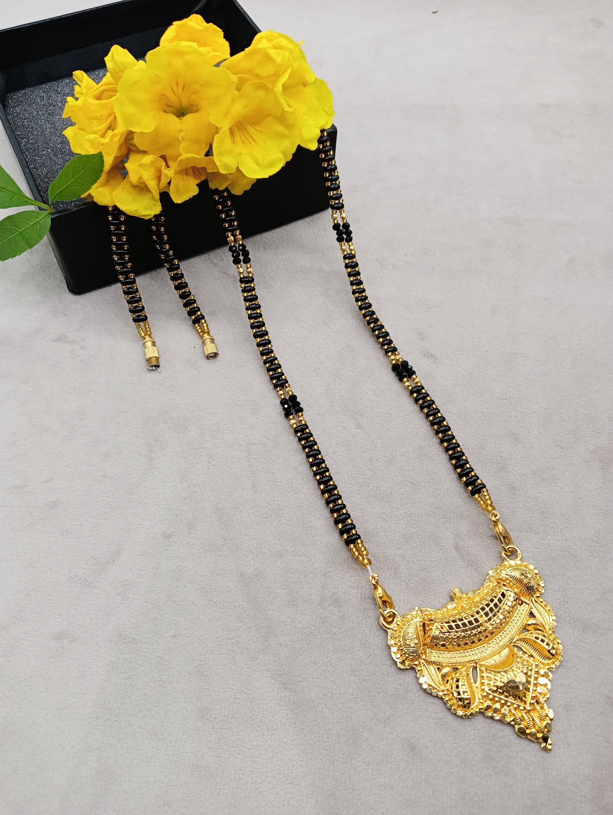 SHANKHRAJ MA LL Golden Mangalsutra ( Pack of 1 ) SHANKHRAJ MA LL Golden Mangalsutra ( Pack of 1 )