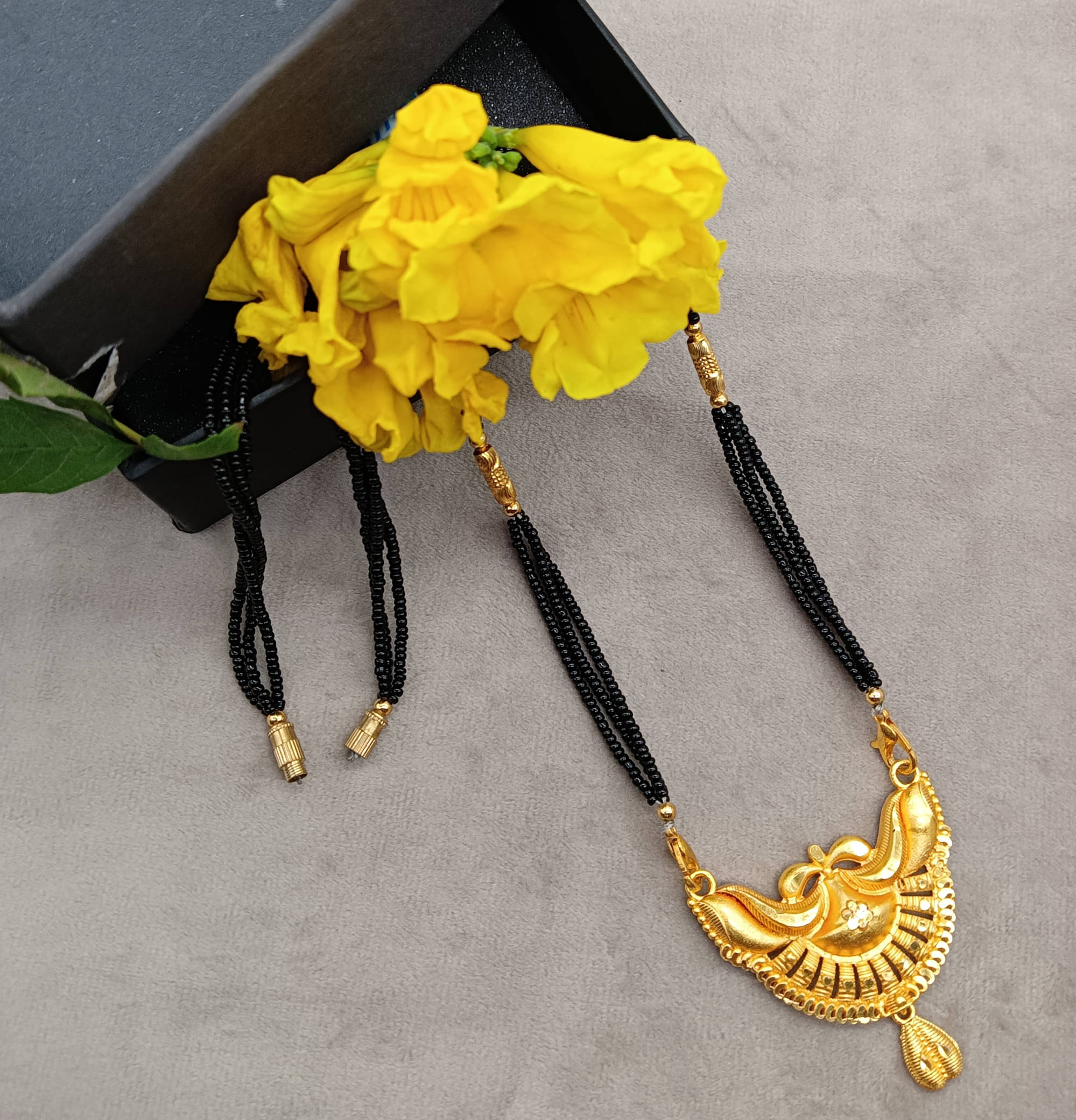     			SHANKHRAJ MA LL Golden Mangalsutra ( Pack of 1 )