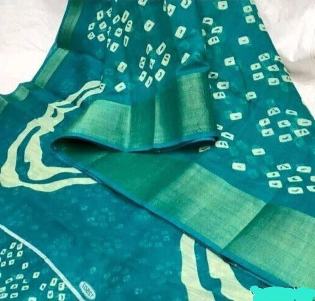 Suali Cotton Blend Self Design Saree With Unstitched Blouse Piece ( Purple ) Suali Cotton Blend Self Design Saree With Unstitched Blouse Piece ( Purple )