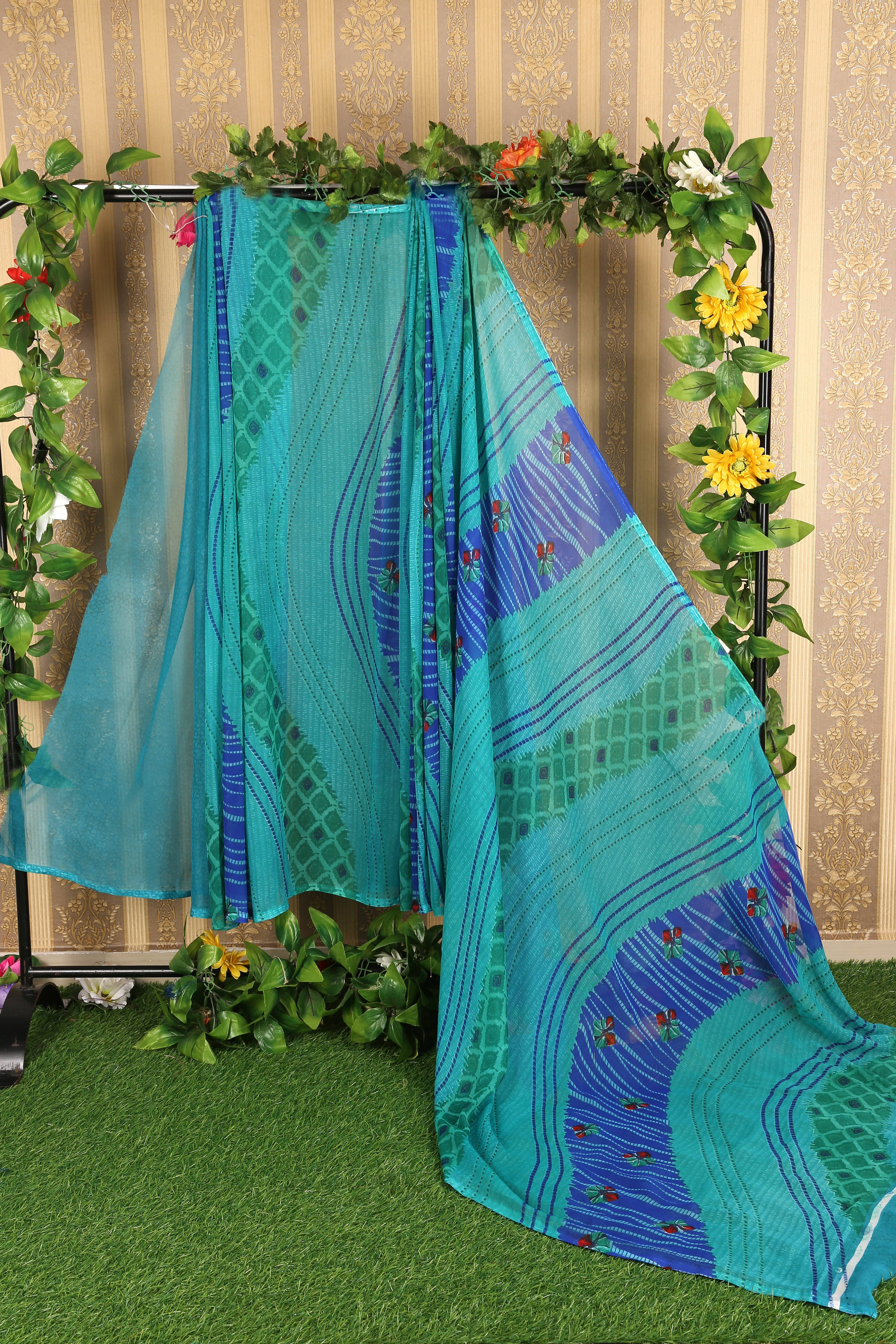 Suali Georgette Printed Saree With Unstitched Blouse Piece ( Light Green ) Suali Georgette Printed Saree With Unstitched Blouse Piece ( Light Green )