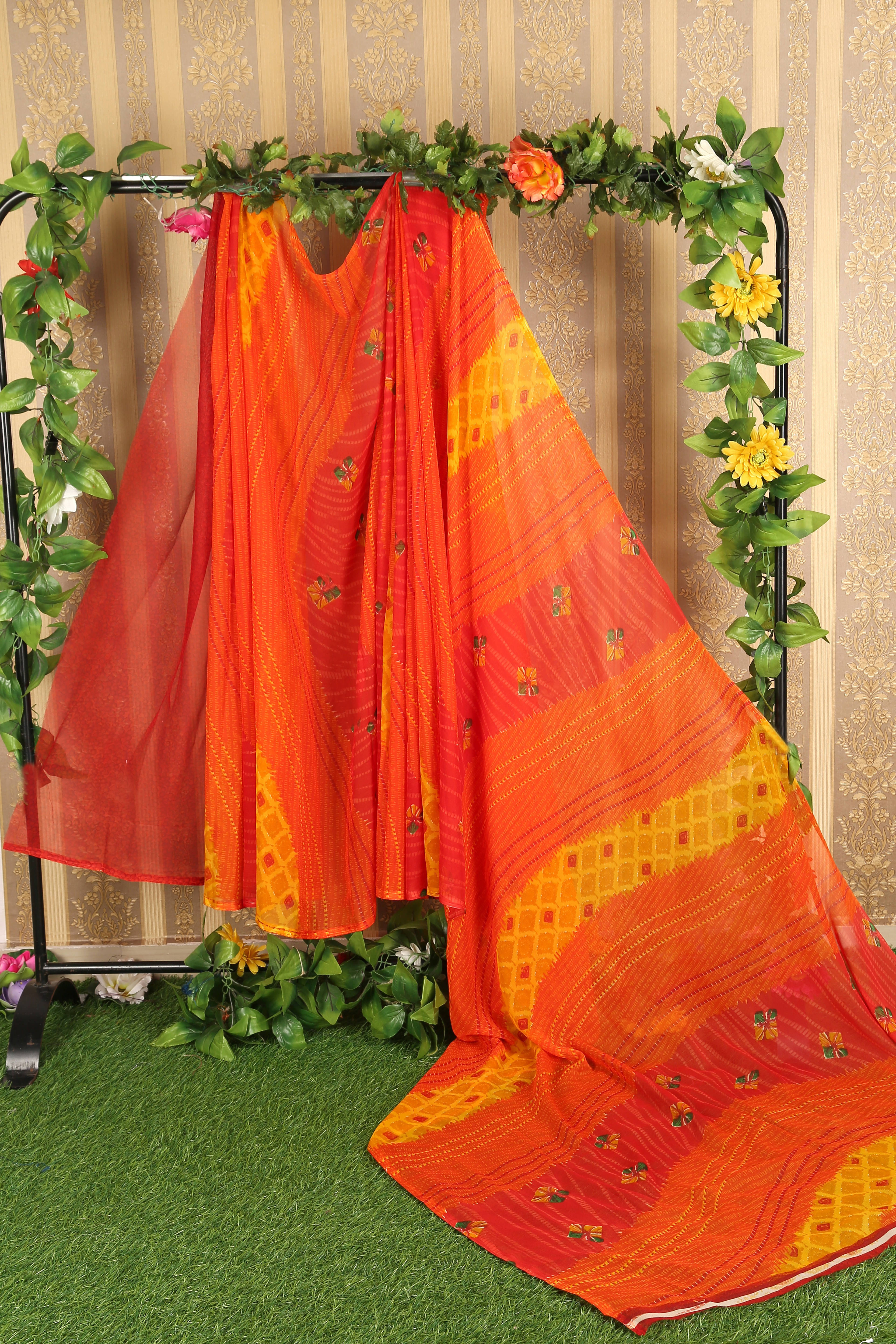 Suali Georgette Printed Saree With Unstitched Blouse Piece ( Orange ) Suali Georgette Printed Saree With Unstitched Blouse Piece ( Orange )